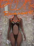 Front view metallic gold cutout bodysuit with keyhole chest and thong bottom