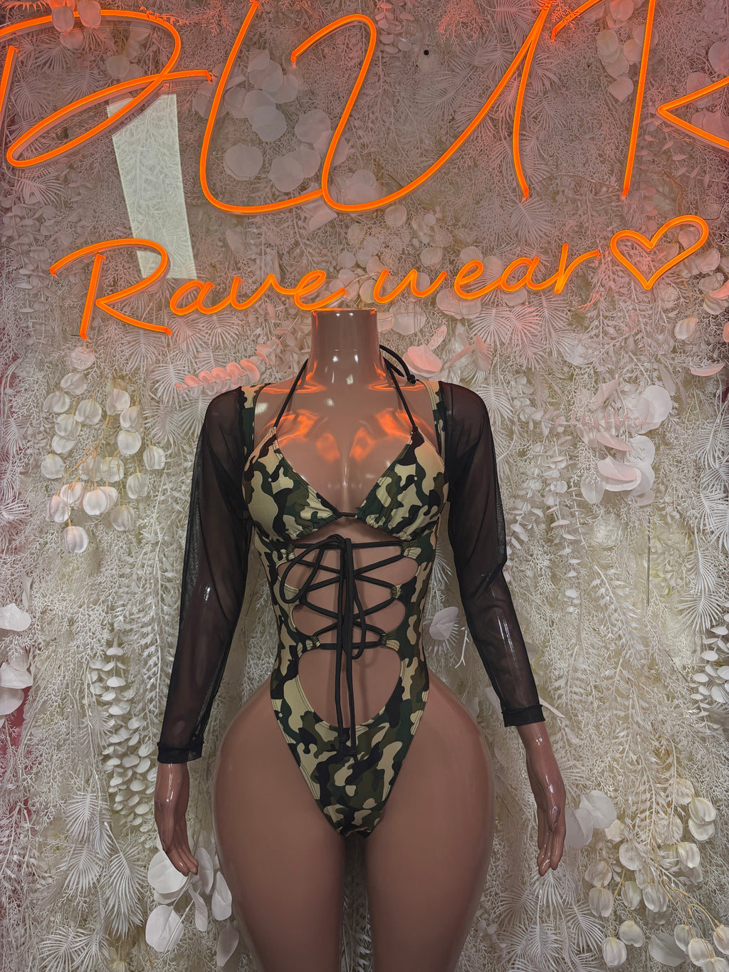 Camouflage bodysuit with lace-up front, sheer black mesh sleeves, long-sleeve