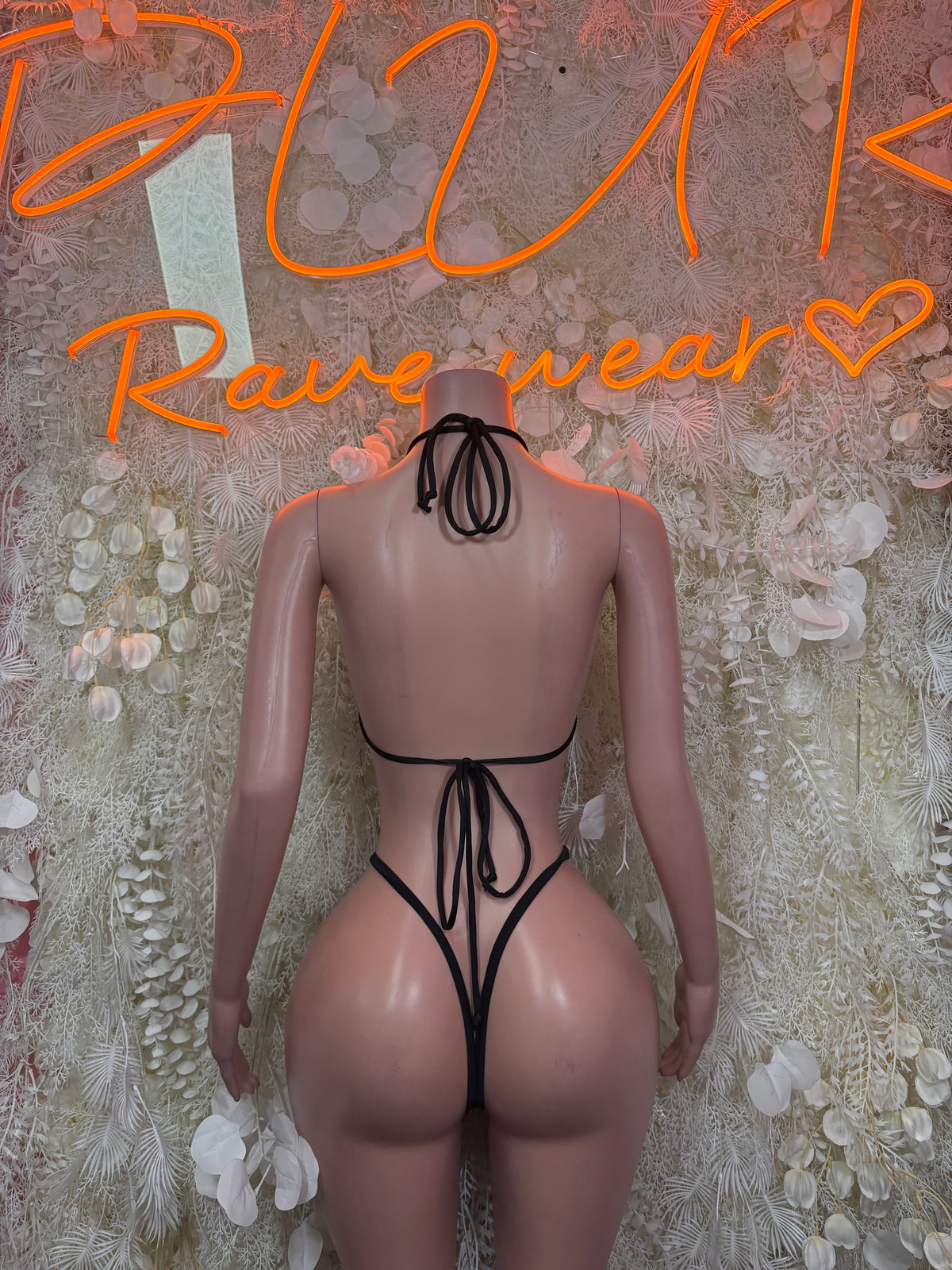 Backless black cutout bodysuit with lace-up tie and thong-style back
