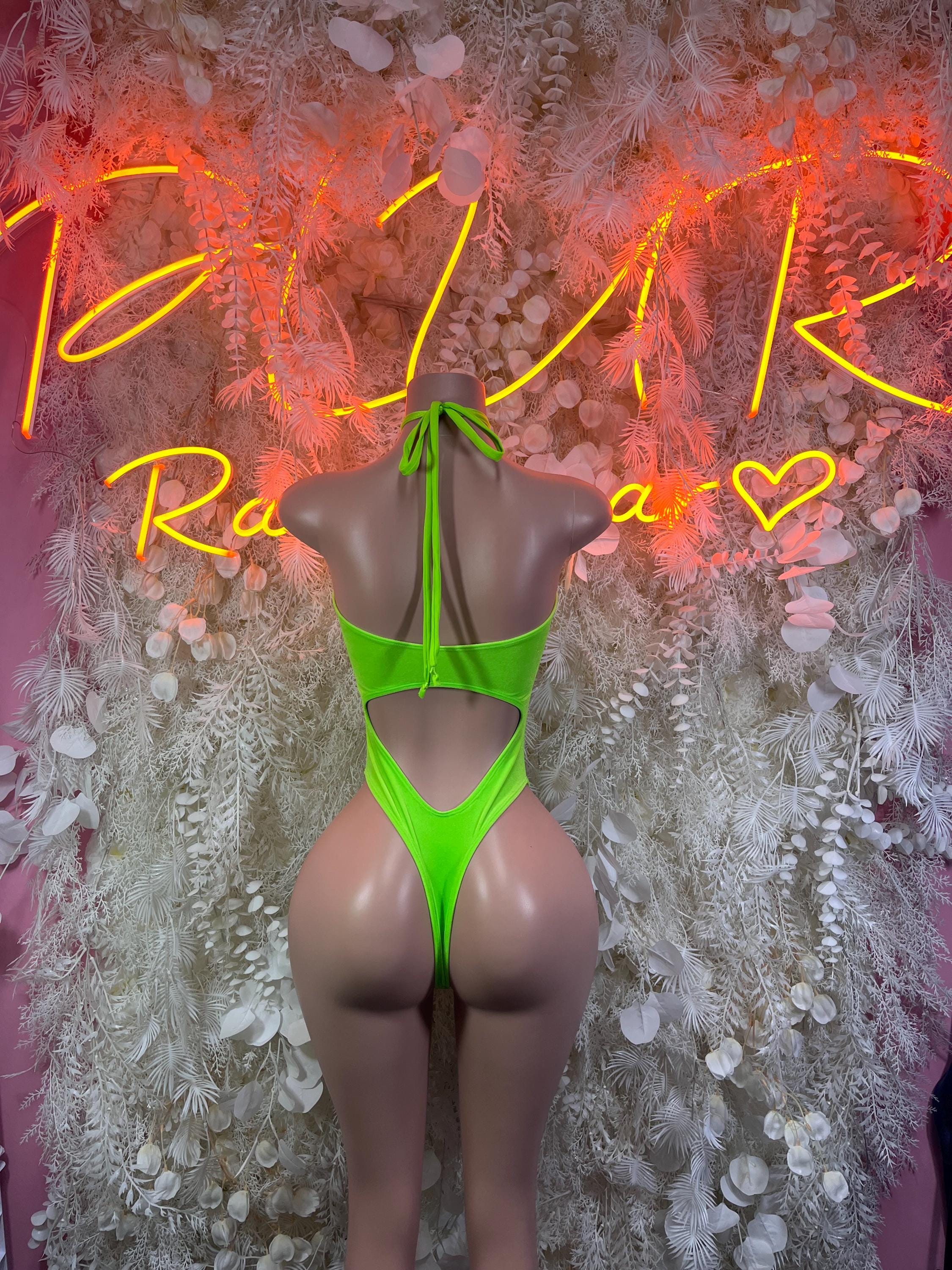 Neon green bodysuit with back tie detail and deep V cutout front
