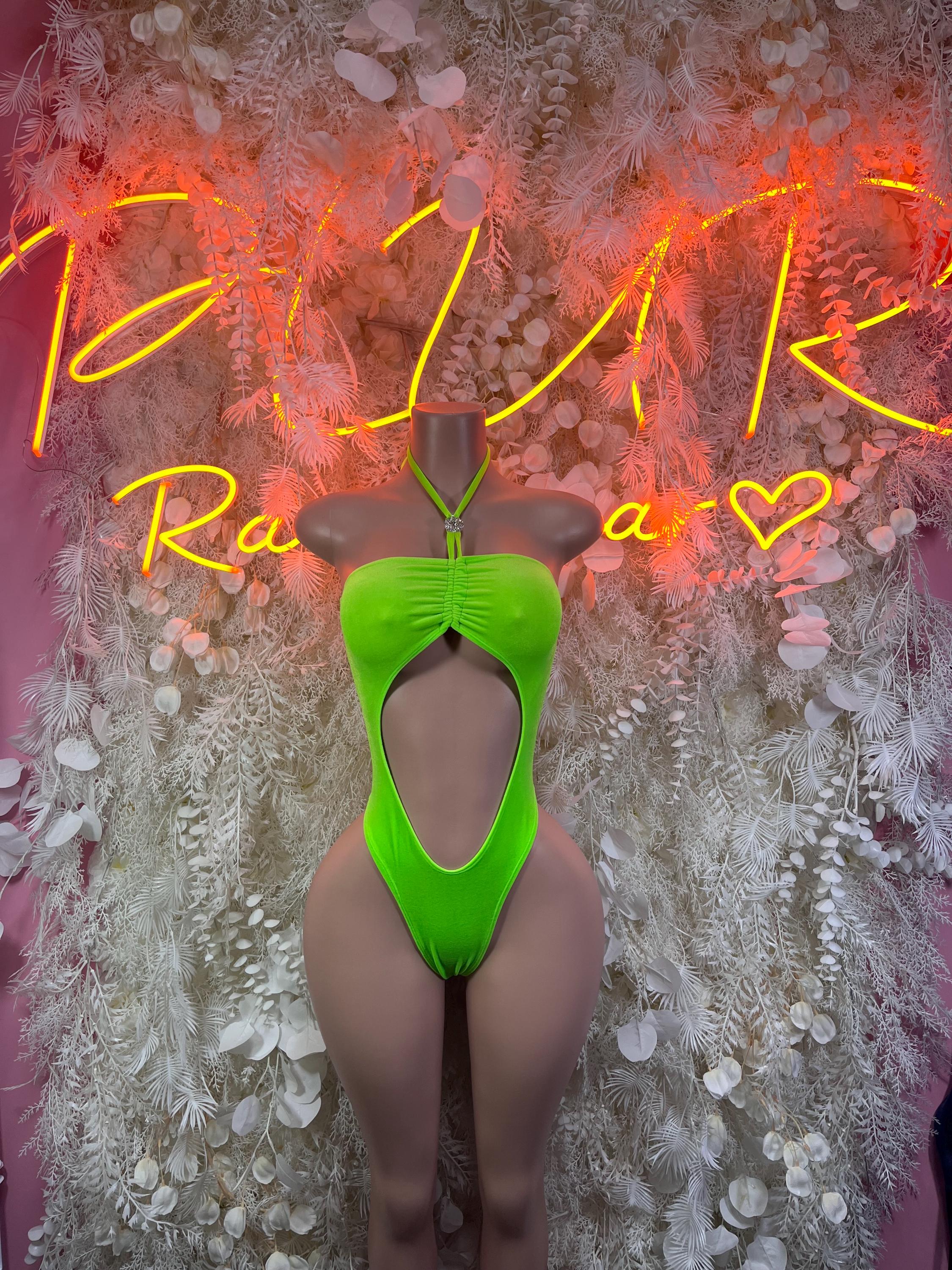 Neon green one-piece bodysuit with wide cutout front and halter neck strap