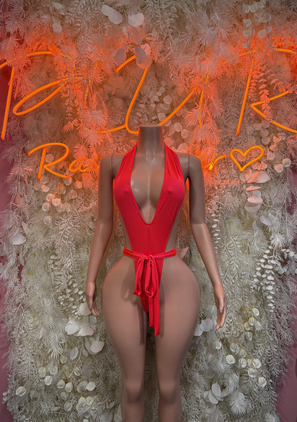 Coral red one-piece festival swimsuit with halter neckline and front tie waist