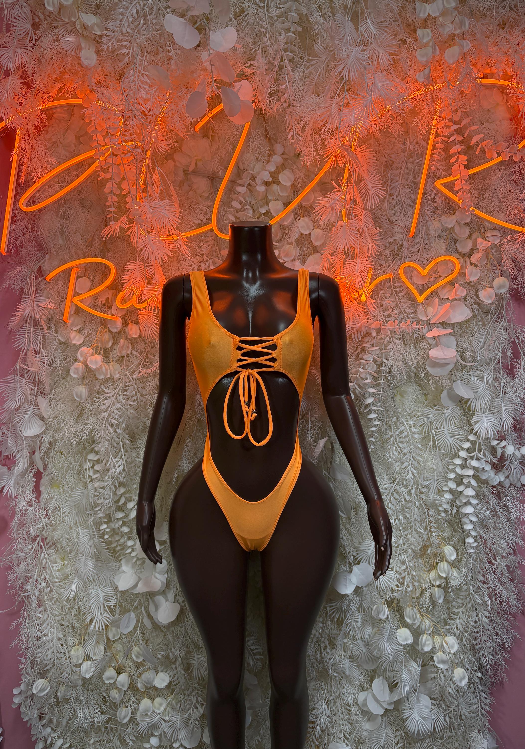 Orange lace-up cutout bodysuit with string tie front