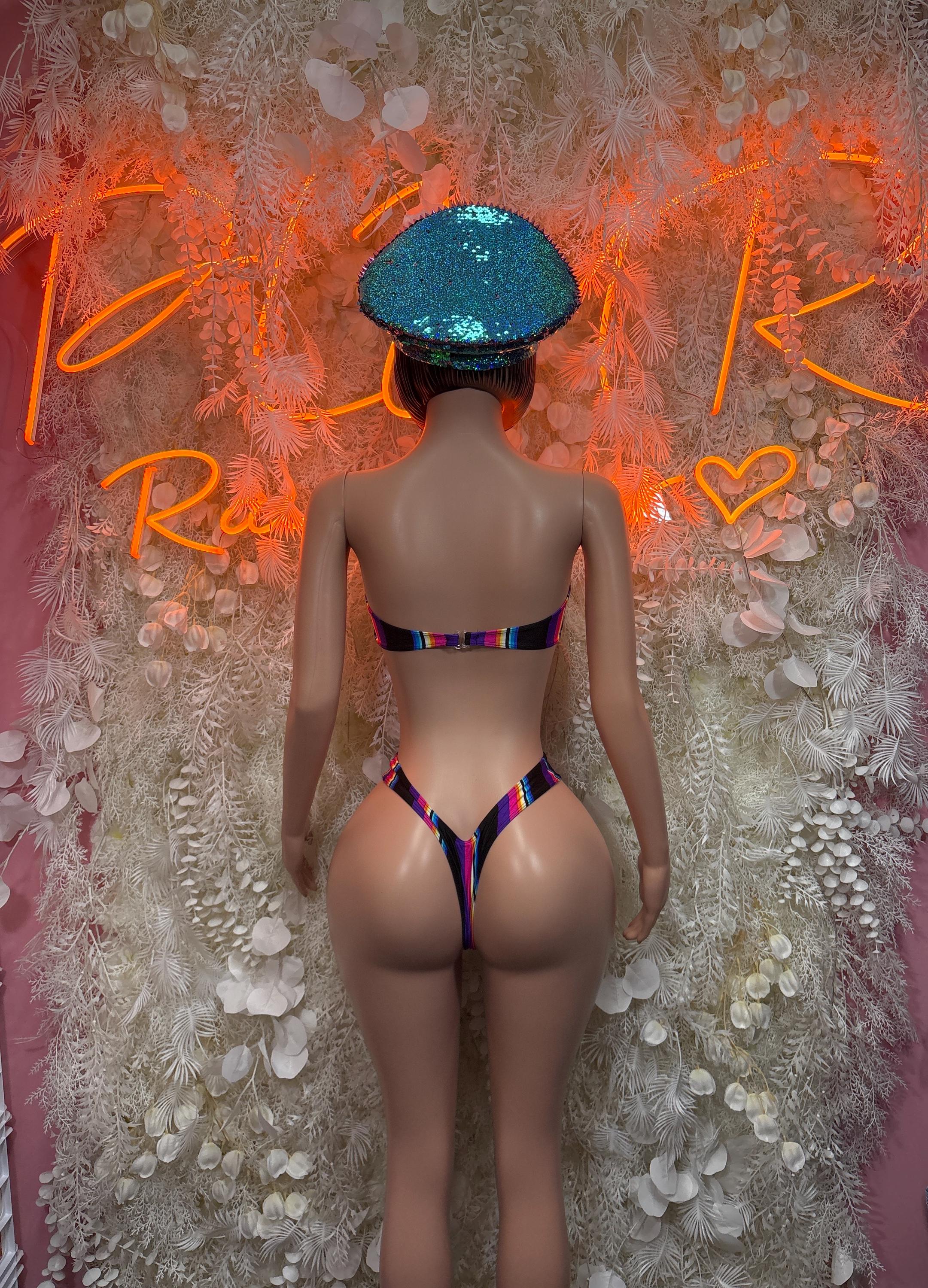 Multicolor two-piece festival outfit: bikini bottoms and matching hat, back view