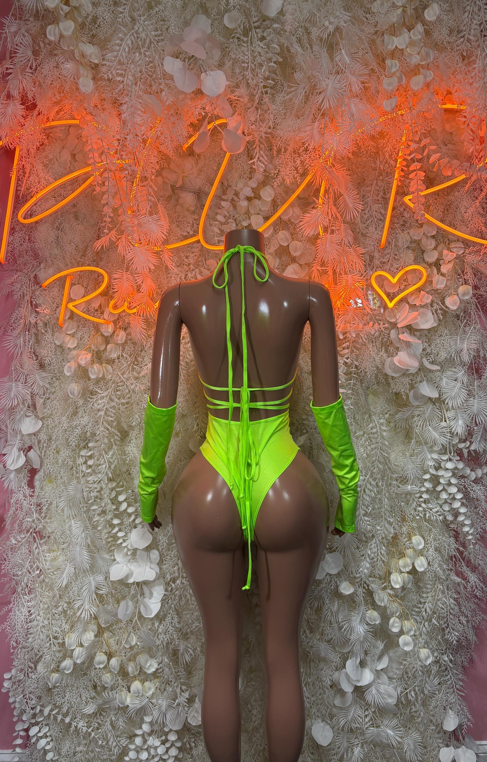 Neon green long-sleeve one-piece rave outfit with crisscross back straps