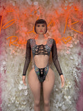 Women’s festival bodysuit with metallic cheetah print, lace-up front and long sleeves