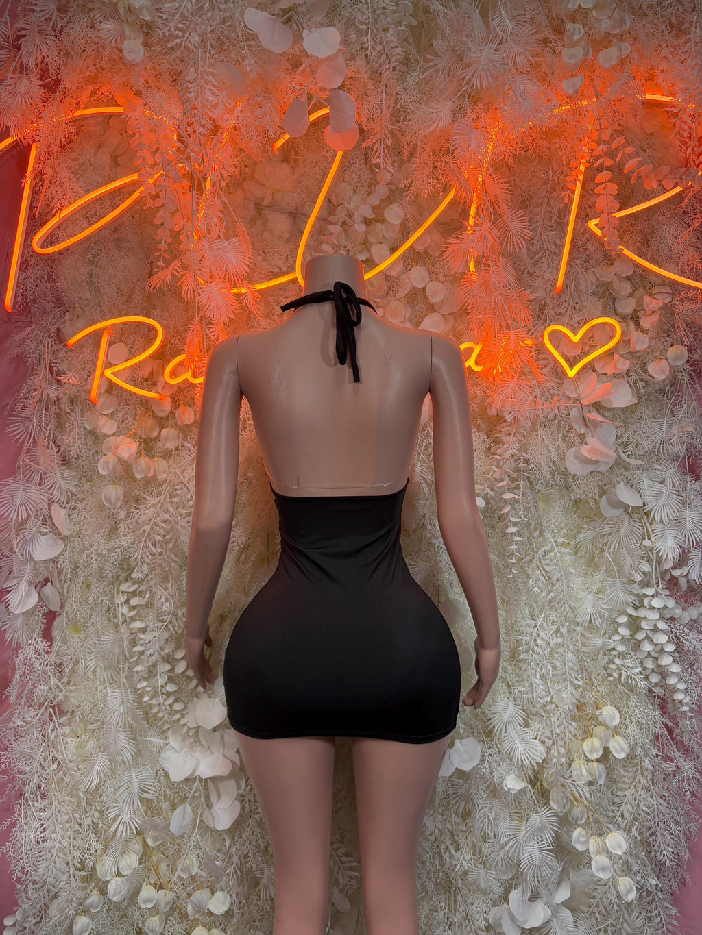 Black mini dress back view with crisscross lace-up spaghetti straps