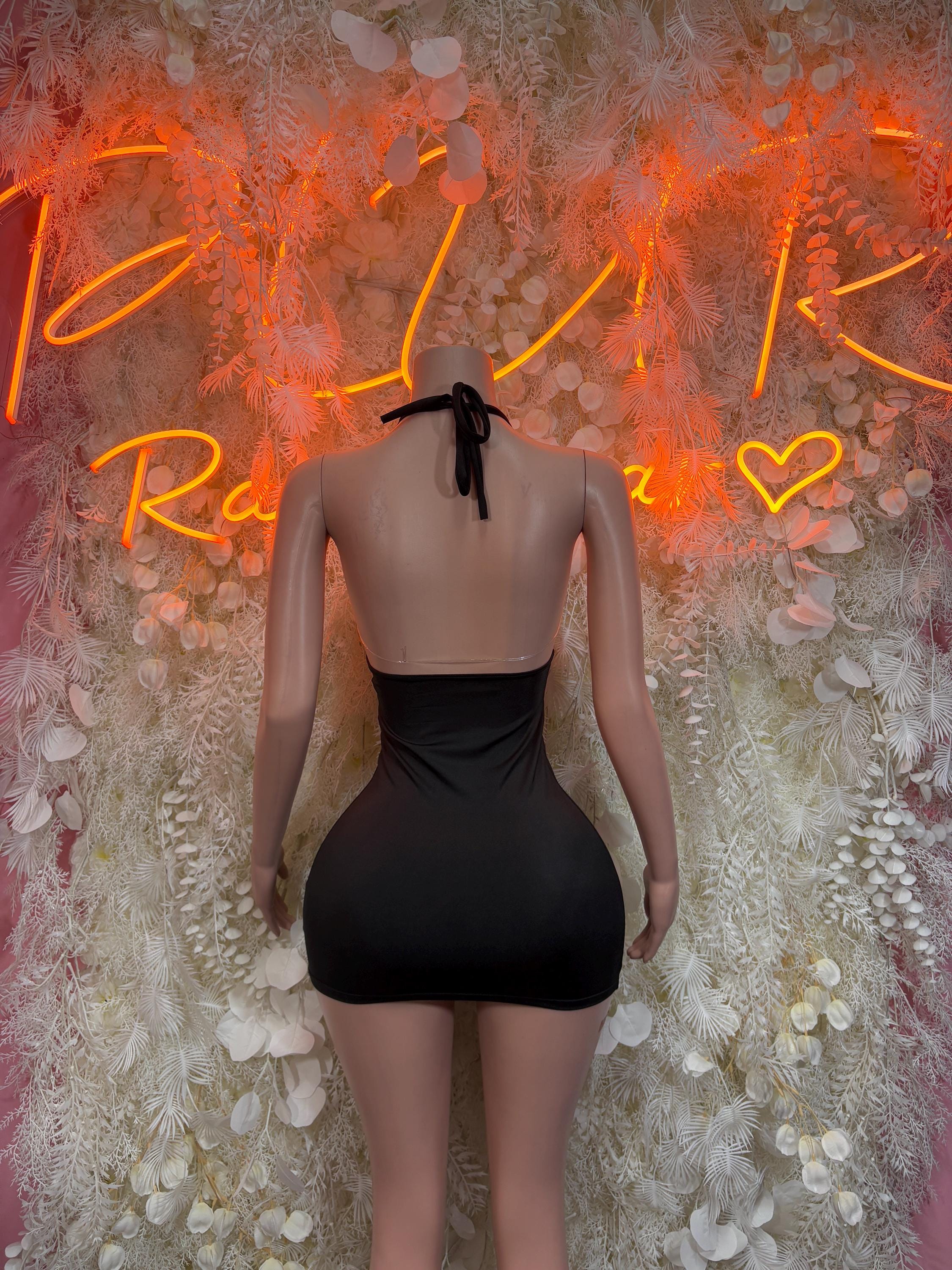 Black mini dress back view with crisscross lace-up spaghetti straps