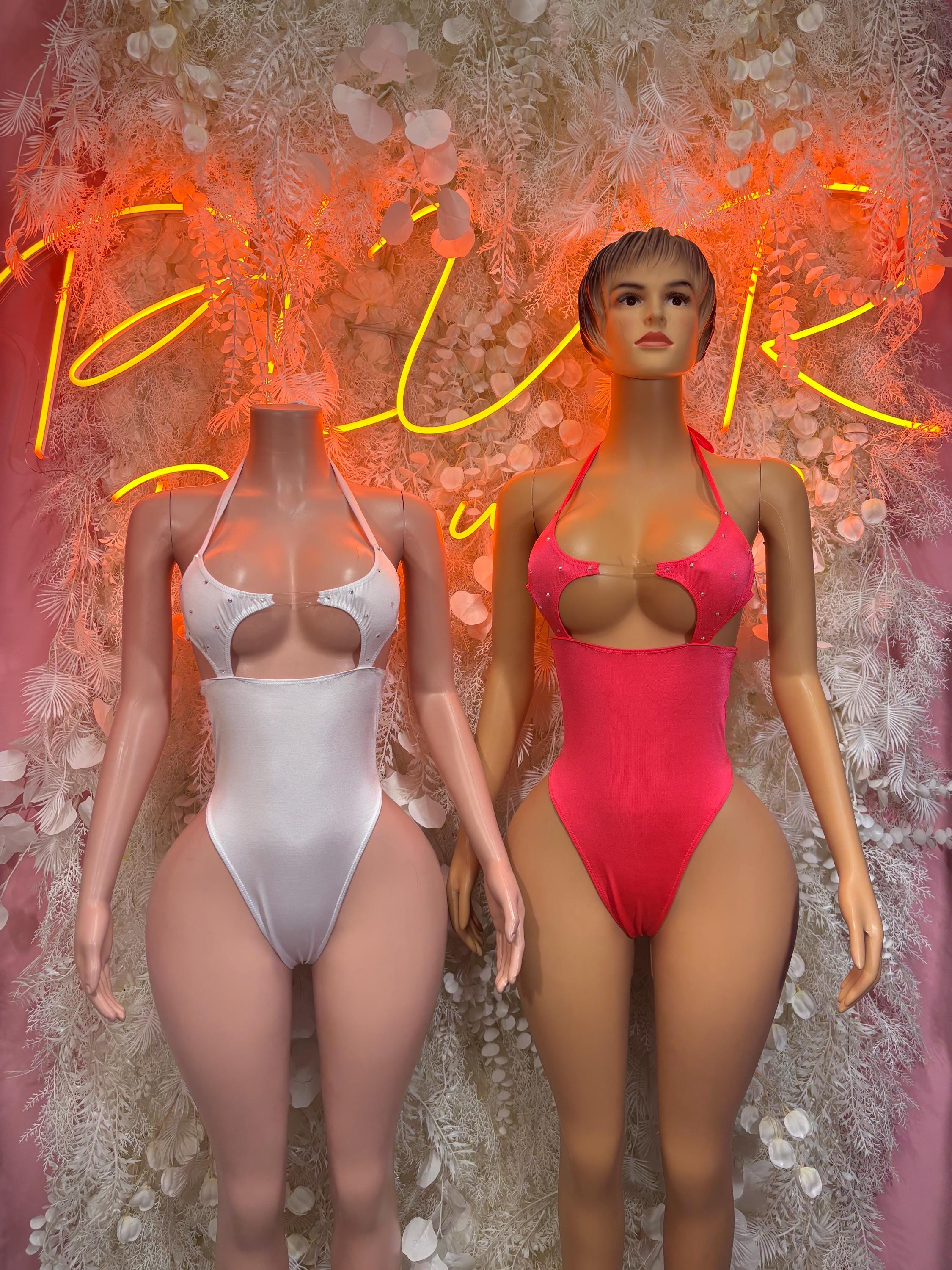 White and red one-piece bodysuits with molded cups, racer-back cut