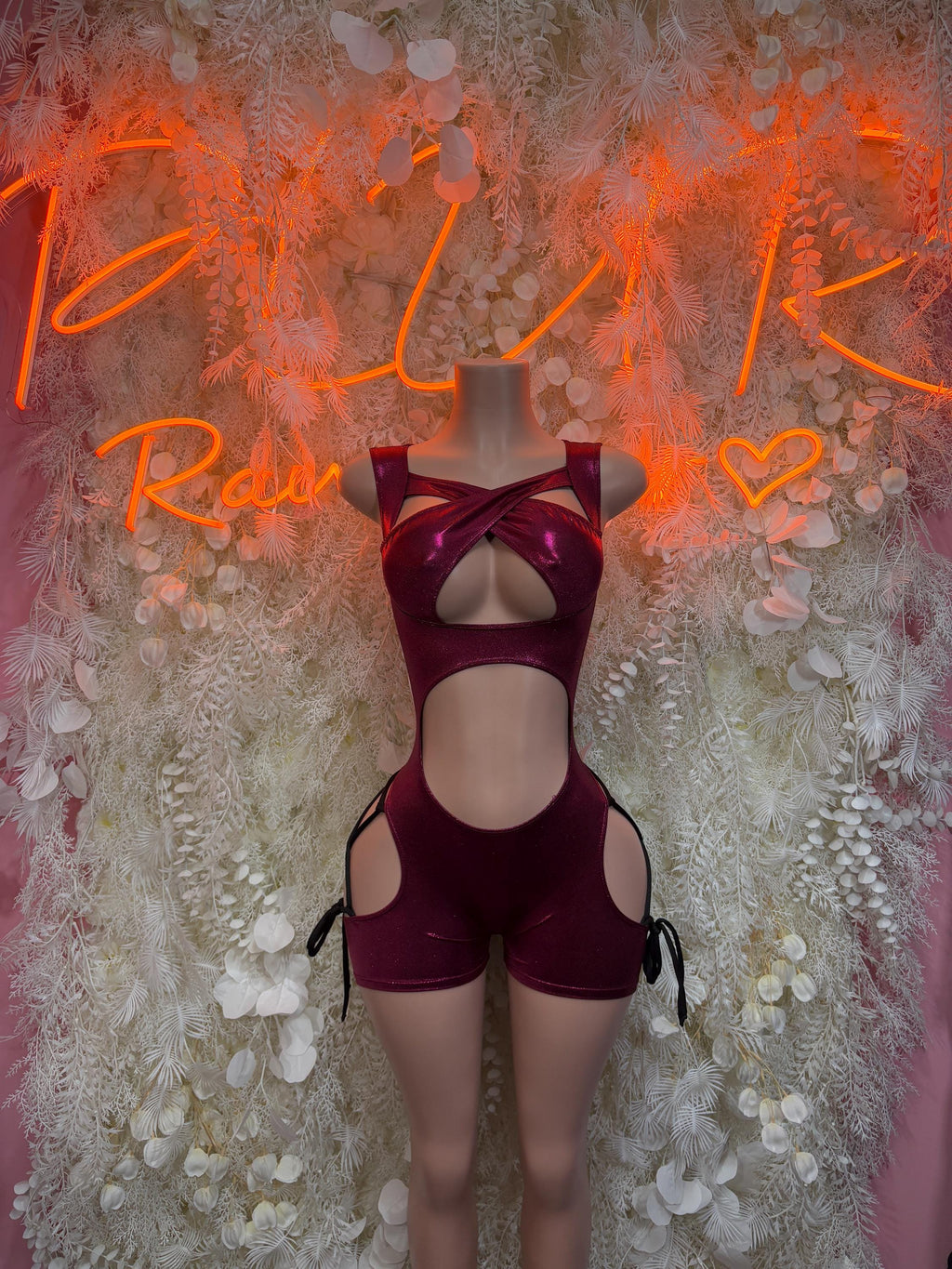 Maroon rave bodysuit with halter neckline and high-leg cutout front