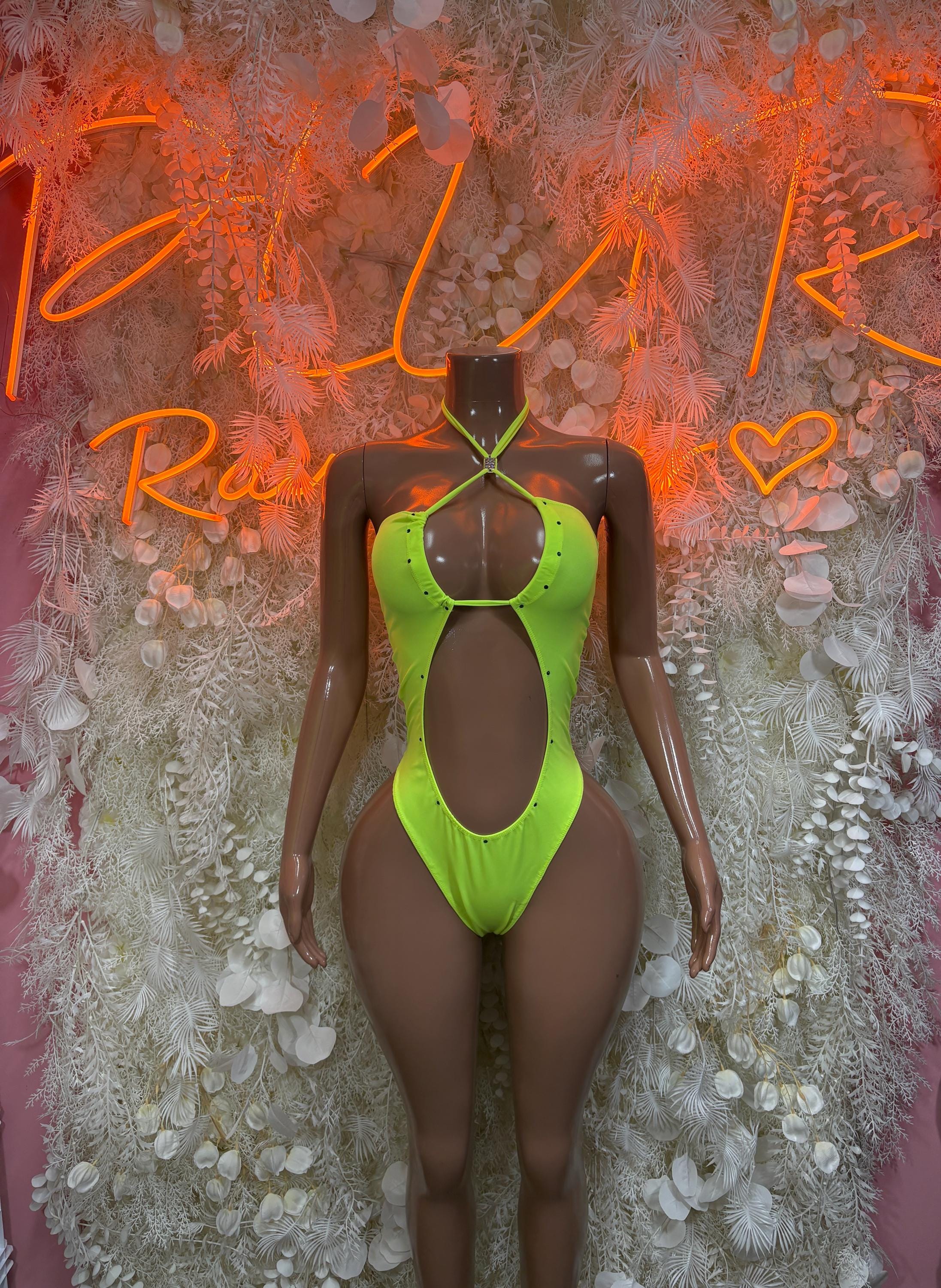 Neon green one-piece rave bodysuit with halter straps and oval chest cutout