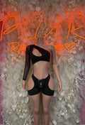 Black sheer long-sleeve bodysuit with cutouts and keyhole front