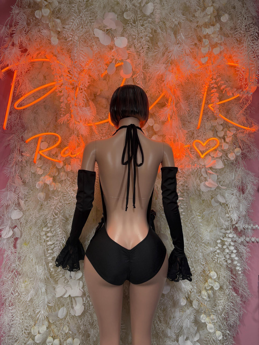 Black lace one-piece with open back tie, long sheer sleeves