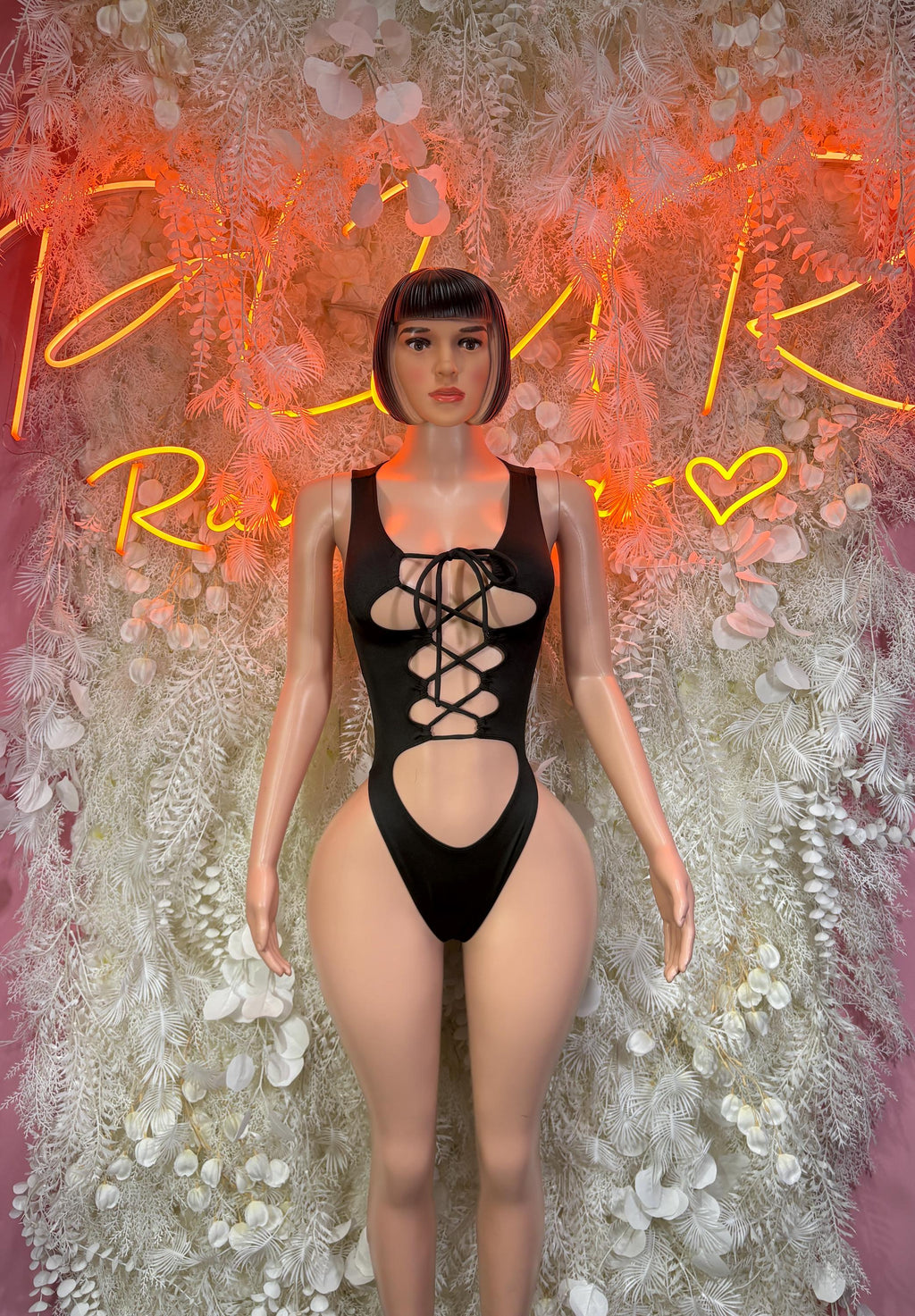 Black lace-up rave bodysuit with sweetheart neckline and front V cutout
