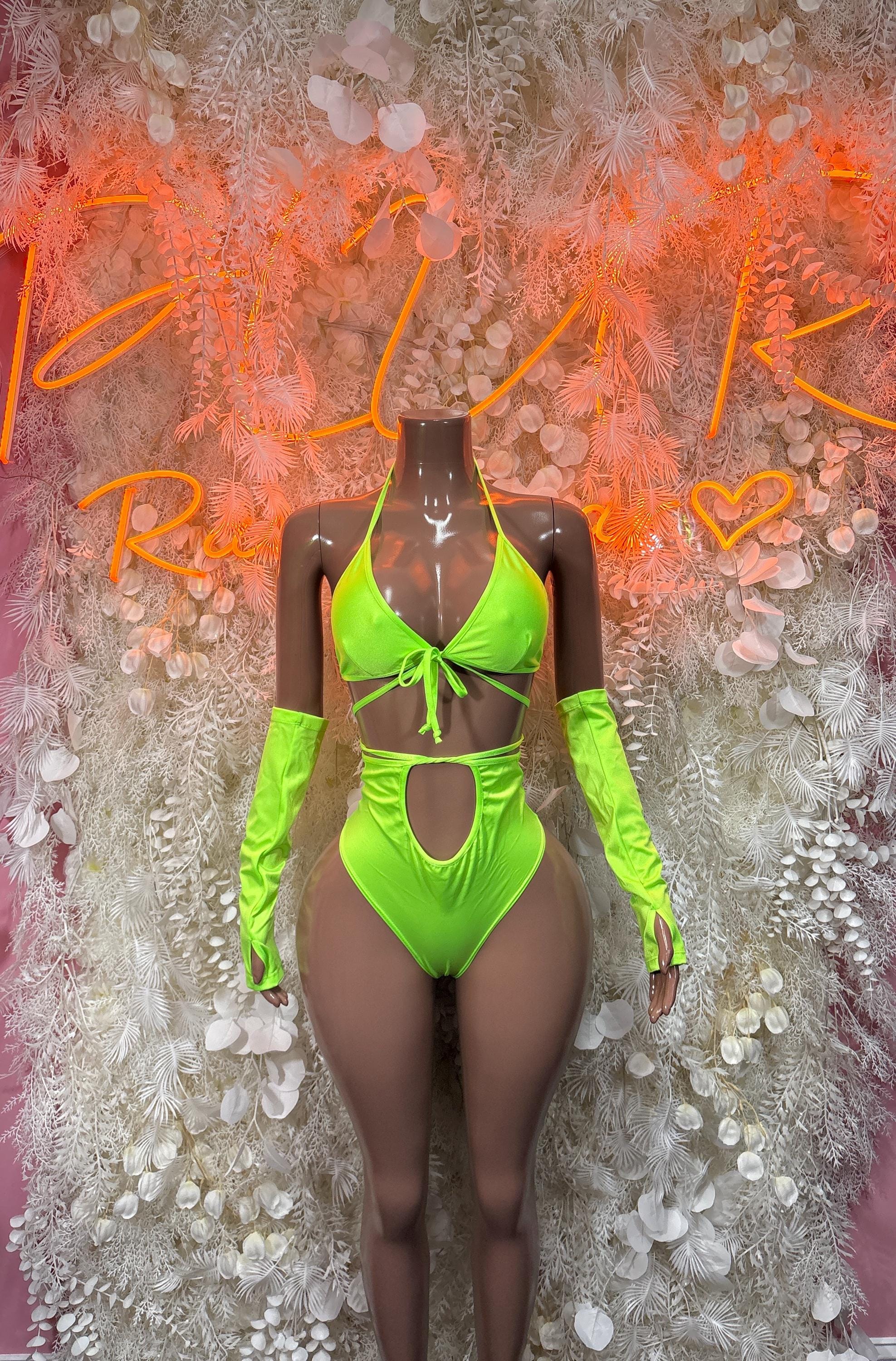 Neon green long-sleeve one-piece rave outfit with tie-front and cutouts