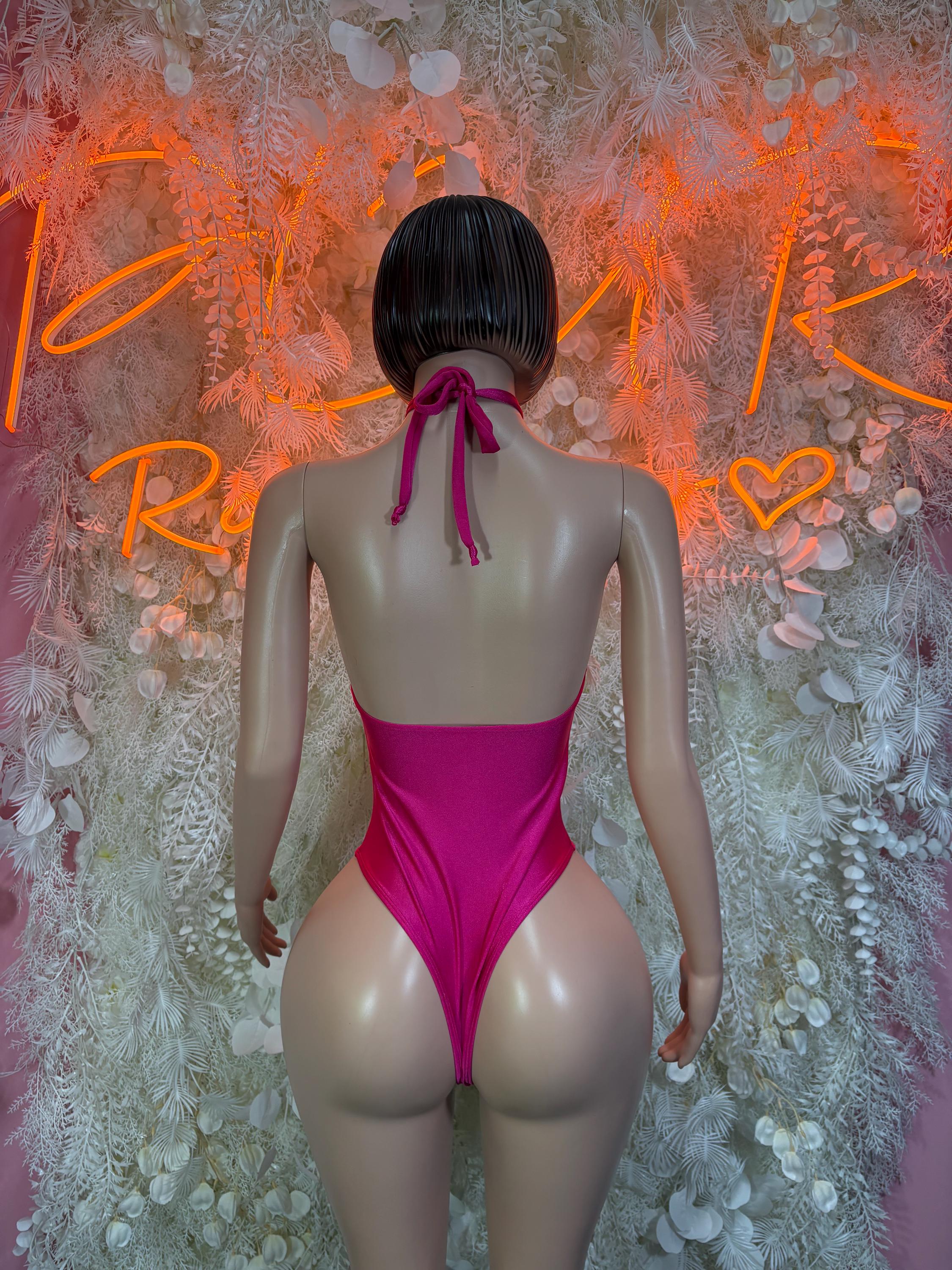 Pink halter one-piece swimsuit with open back and neck tie