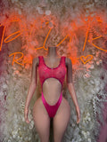Pink mesh bodysuit with scoop neckline, open midriff cutout, and high-leg bottom