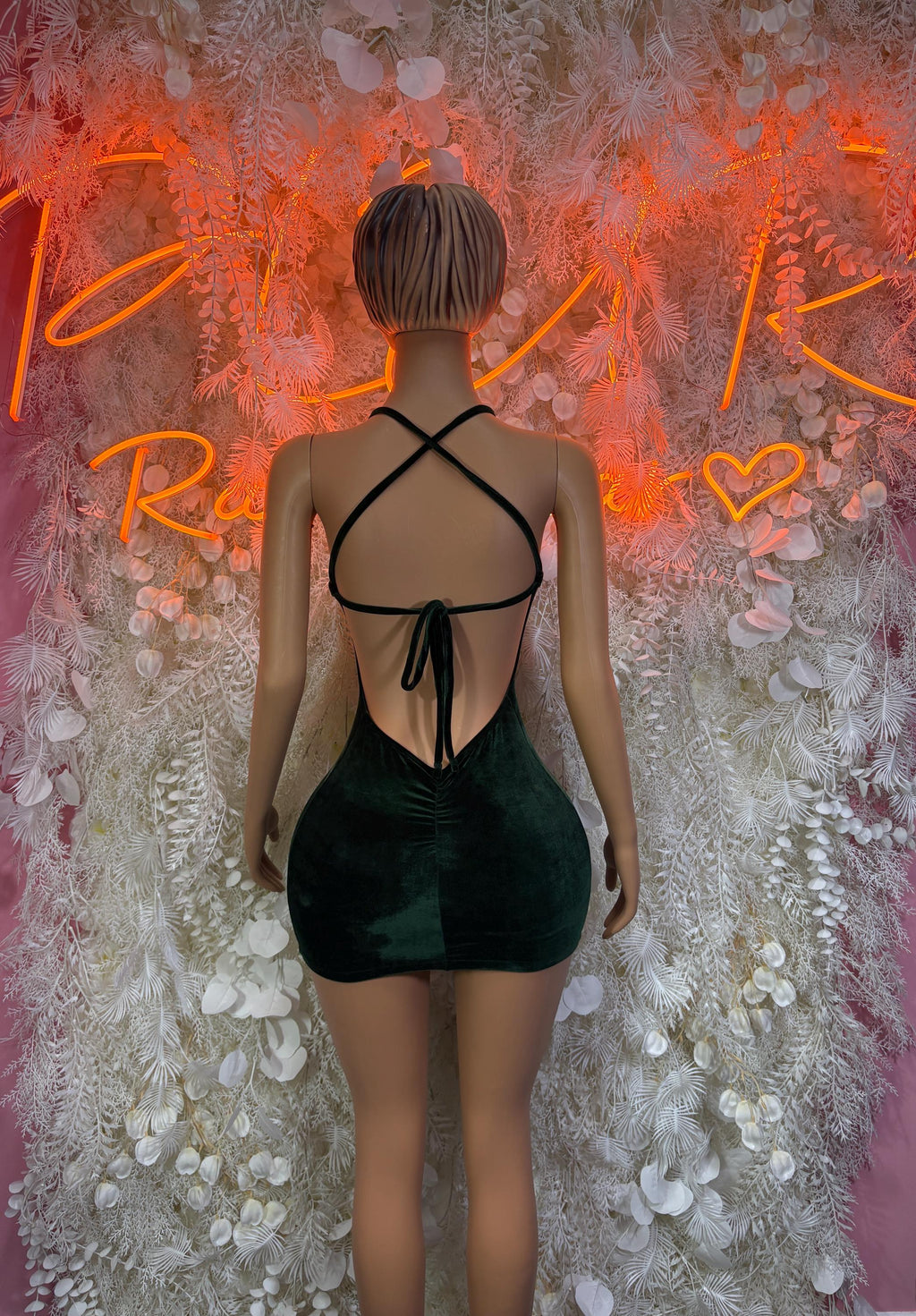 Dark green mini dress, crisscross back straps with bow tie