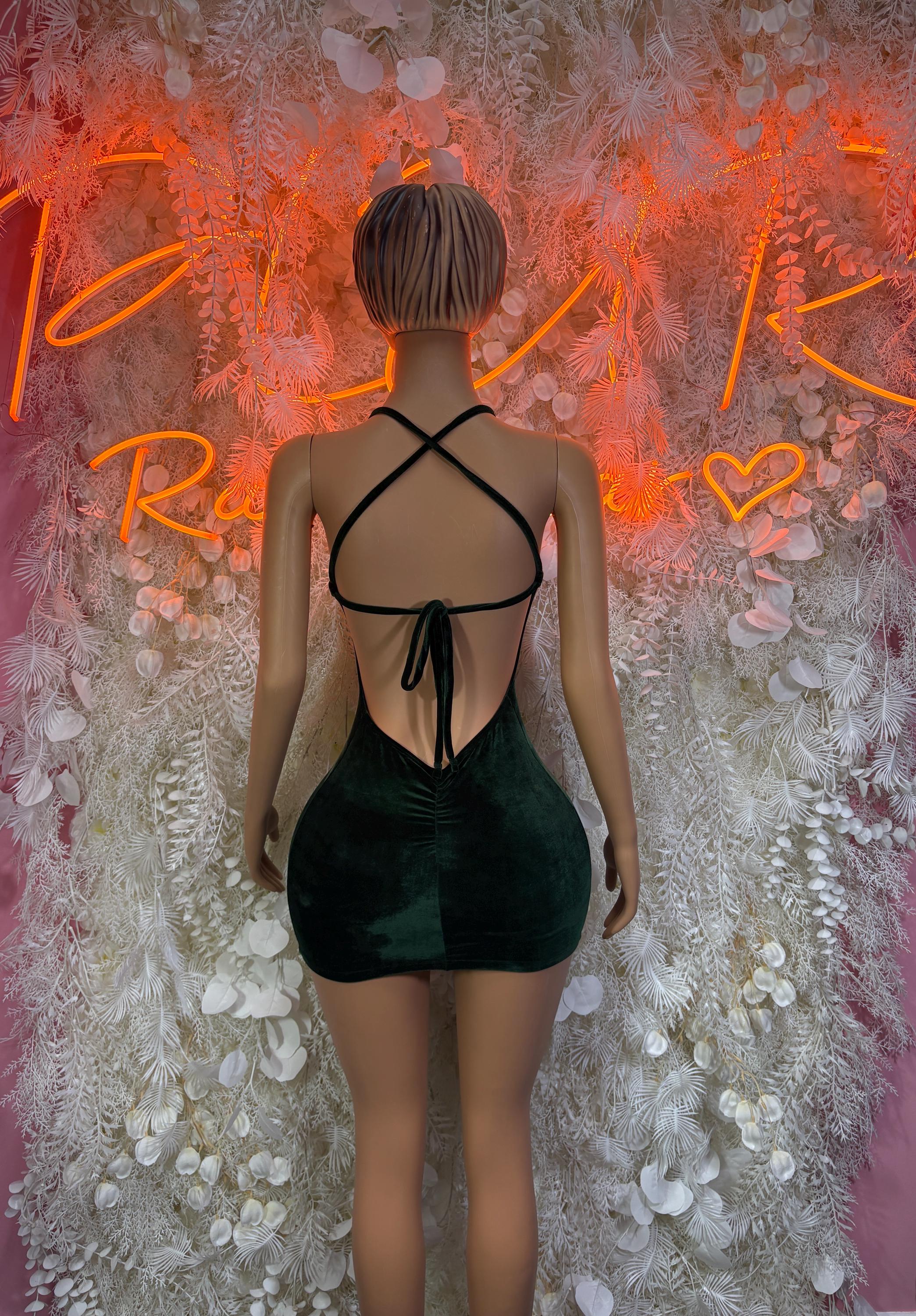 Dark green mini dress, crisscross back straps with bow tie