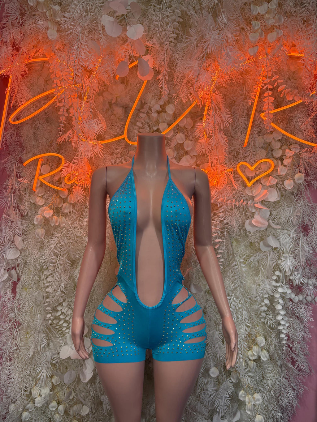 Blue rhinestone cutout bodysuit with halter neckline and strappy front