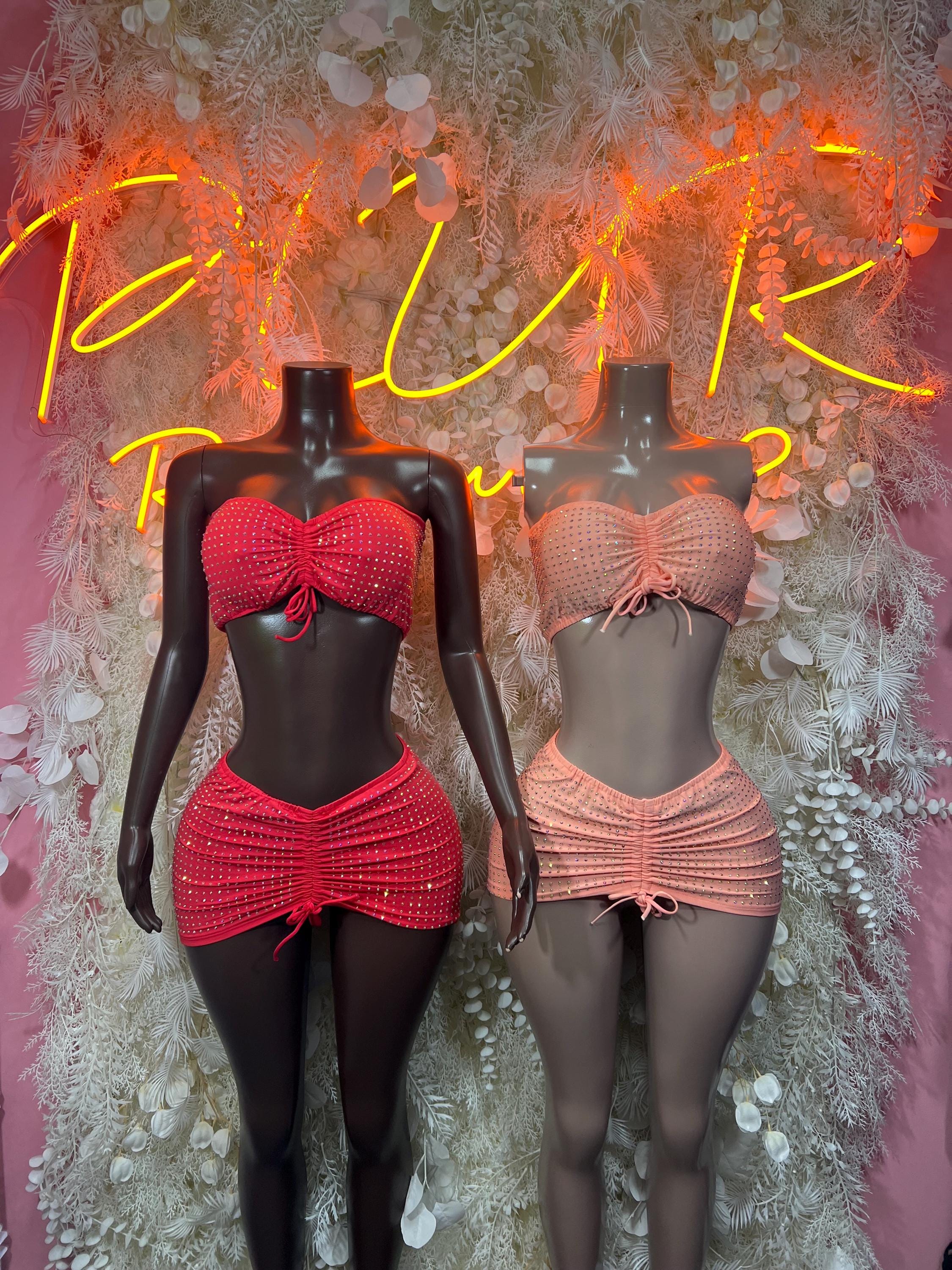 Peach two-piece festival outfit: bow bandeau top and short skirt with ruched texture