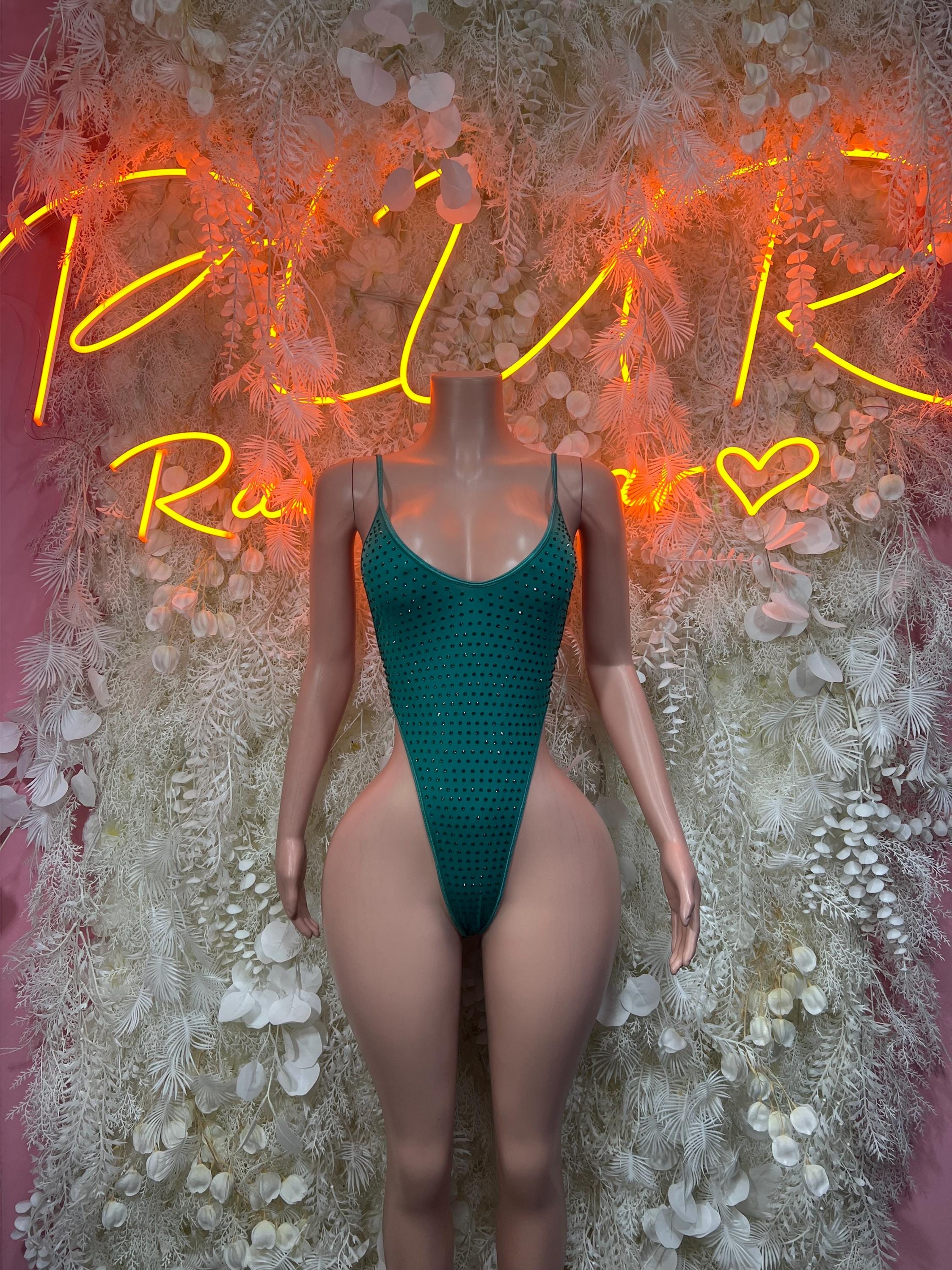 Green mesh one-piece bodysuit with scoop neckline, high-cut legs