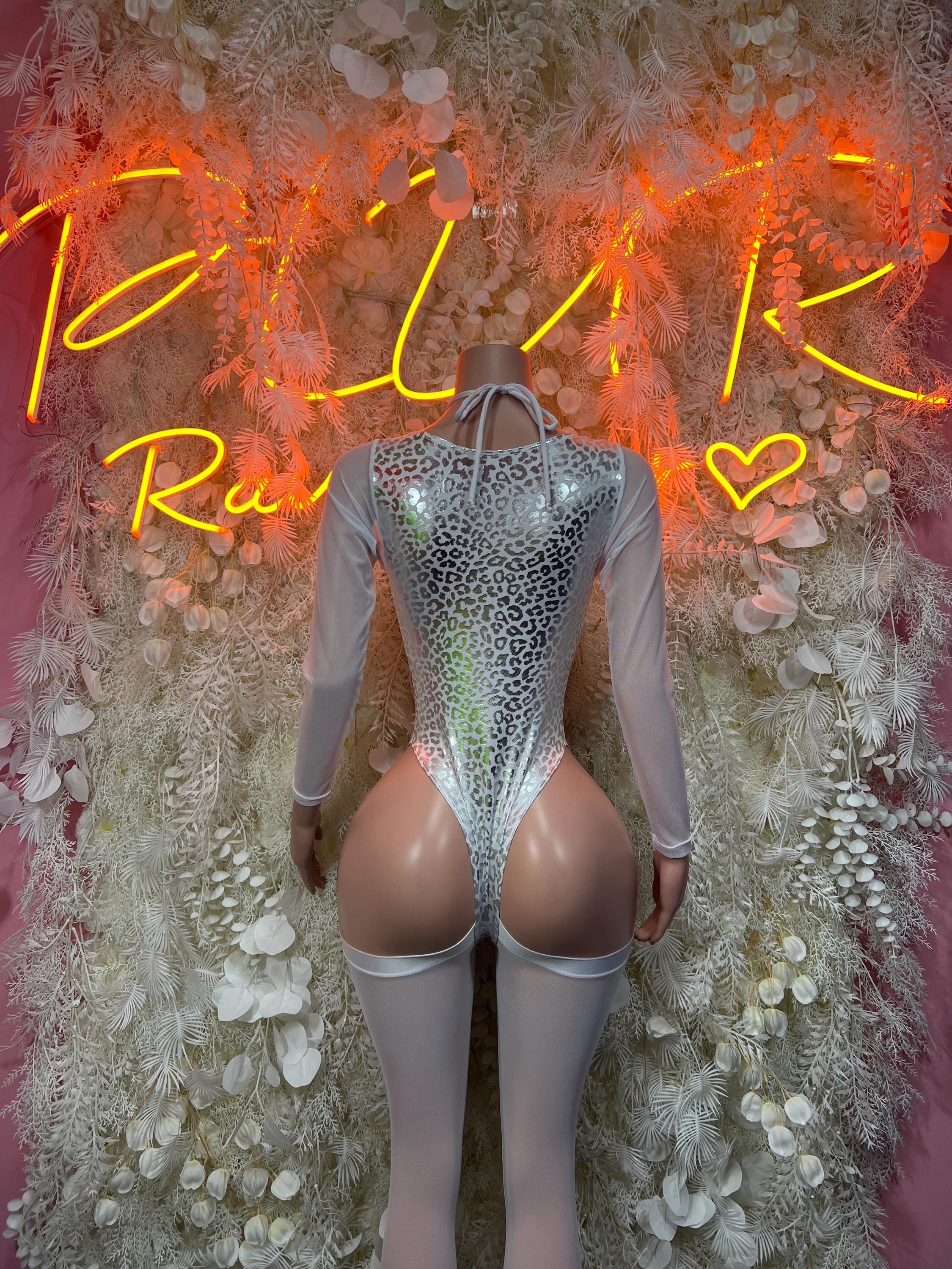 Metallic cheetah print bodysuit with lace-up back and long sleeves
