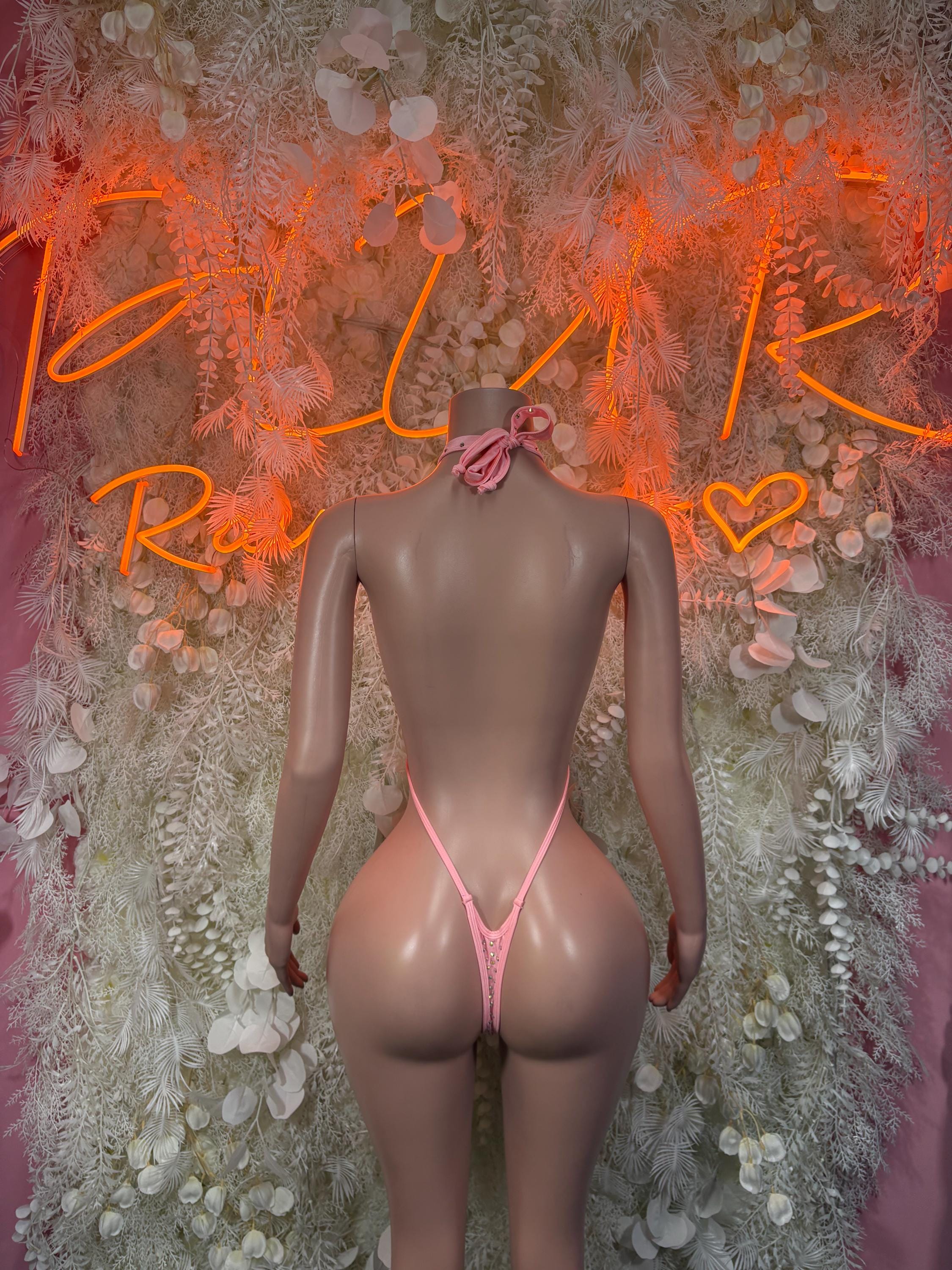 Pink rhinestone halter bodysuit back view, strappy back and V-cut thong