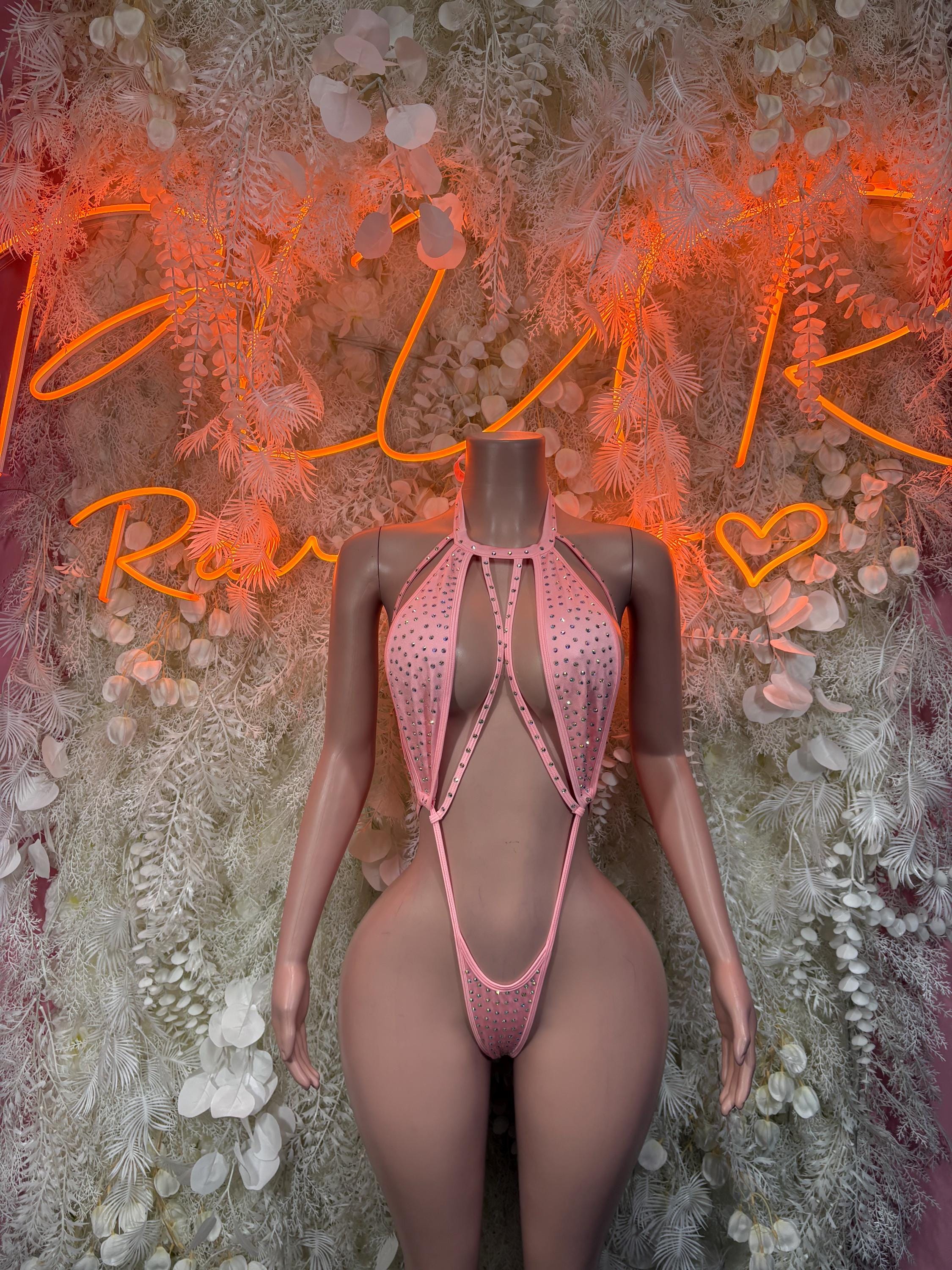 Pink rhinestone halter bodysuit with strappy cutouts and thong back, one-piece
