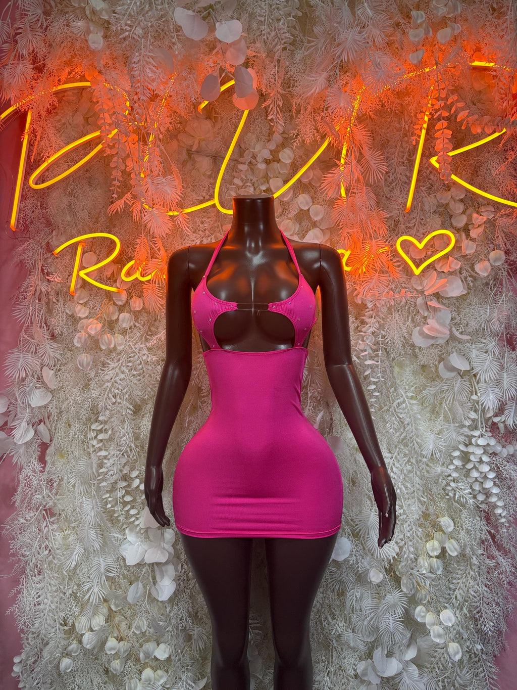 Magenta rave dress with halter bra-style top and cutout bust, sleeveless mini front