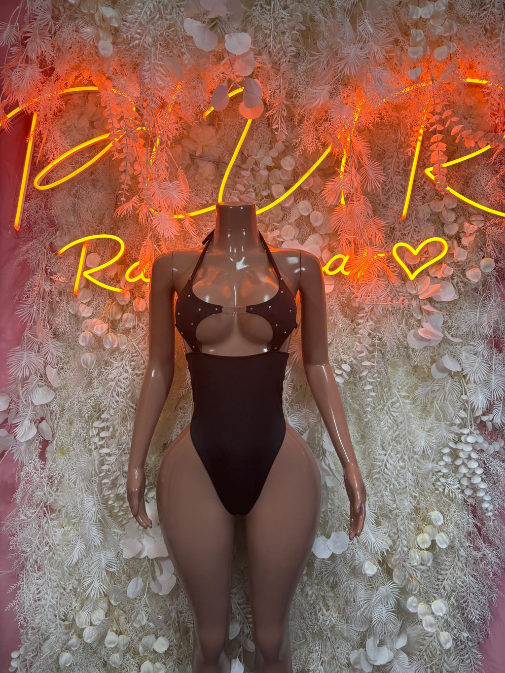 One-piece festival bodysuit, black with thong-cut legs and strappy front detail