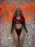 Metallic cherry red rave bodysuit with black mesh long sleeves and lace-up front