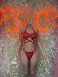 Ravewear red strappy one-piece bikini with crisscross front and high-cut bottom
