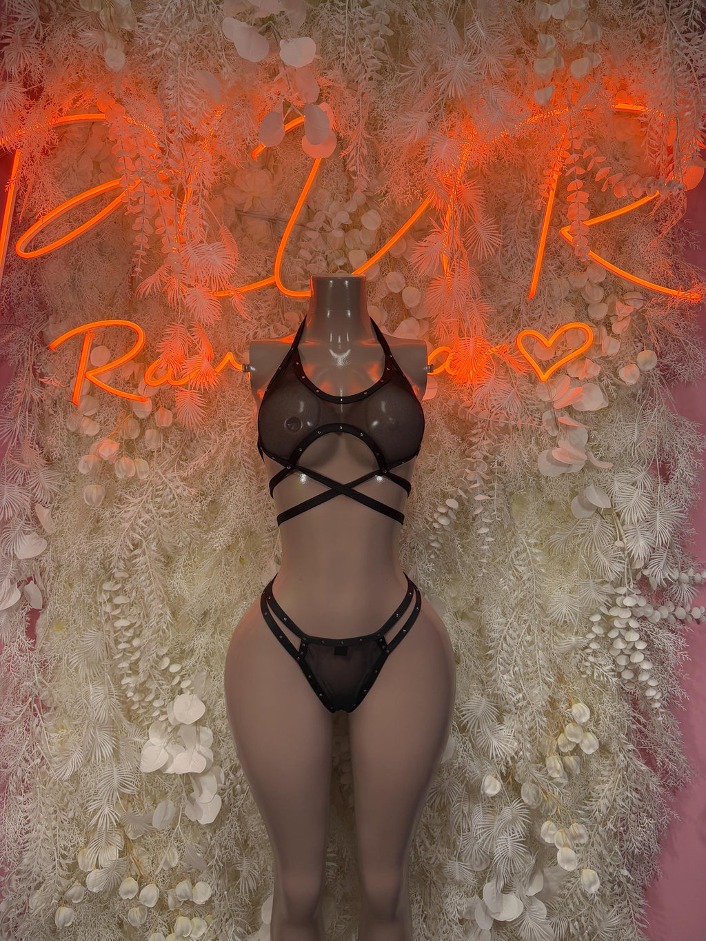 Black strappy rave bikini with halter neck and crisscross cutout straps