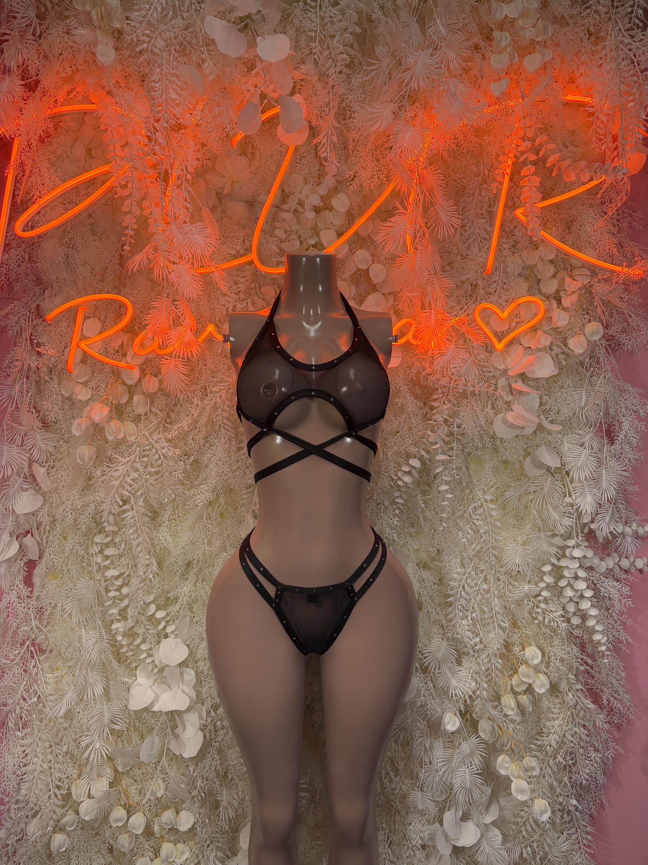 Black strappy rave bikini with halter neck and crisscross cutout straps