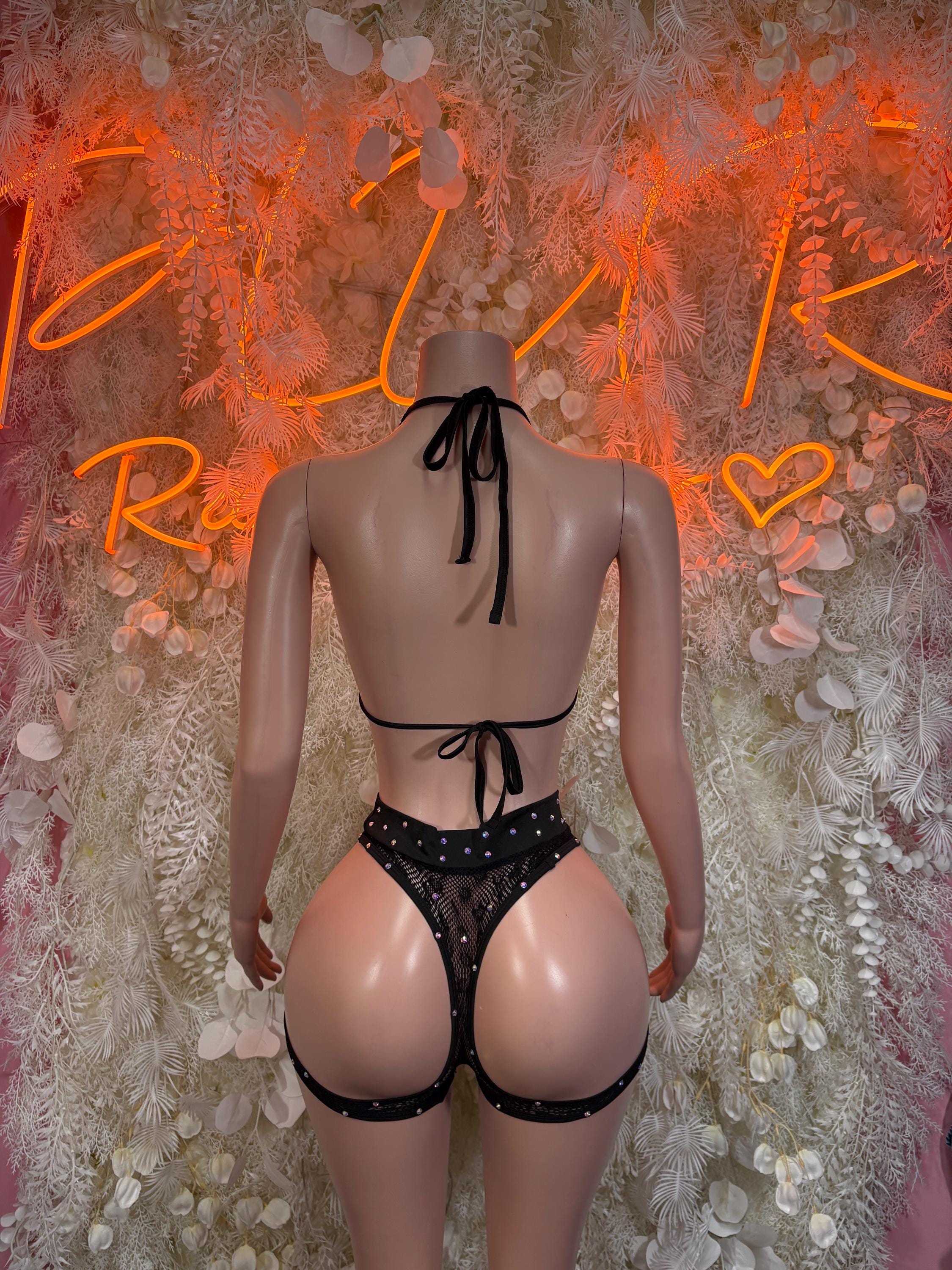 Black fishnet bodysuit with tie-back halter and high-cut bottoms, back view