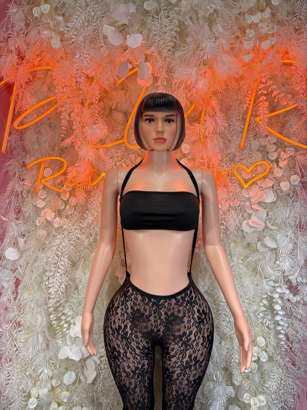 Black fishnet bodysuit with bandeau top and lace-look high-waist pants