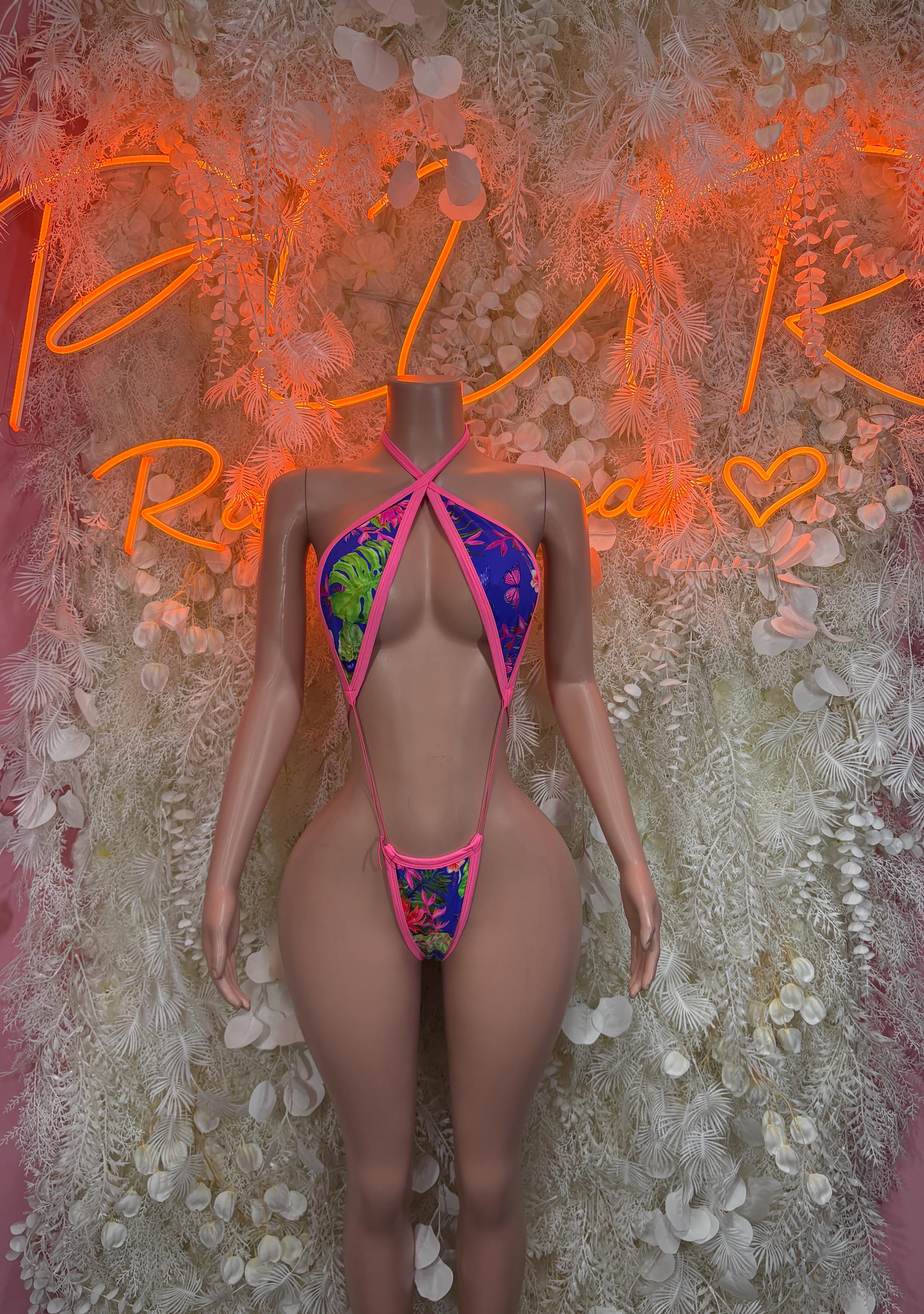 Multicolor one-piece bodysuit with pink straps and front cutouts, backless design