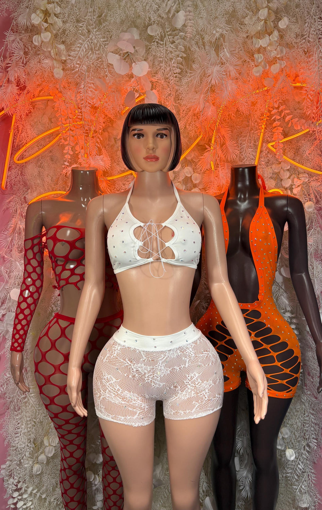 White rave two-piece bodysuit set: halter crop top with cutout ring and high-rise shorts