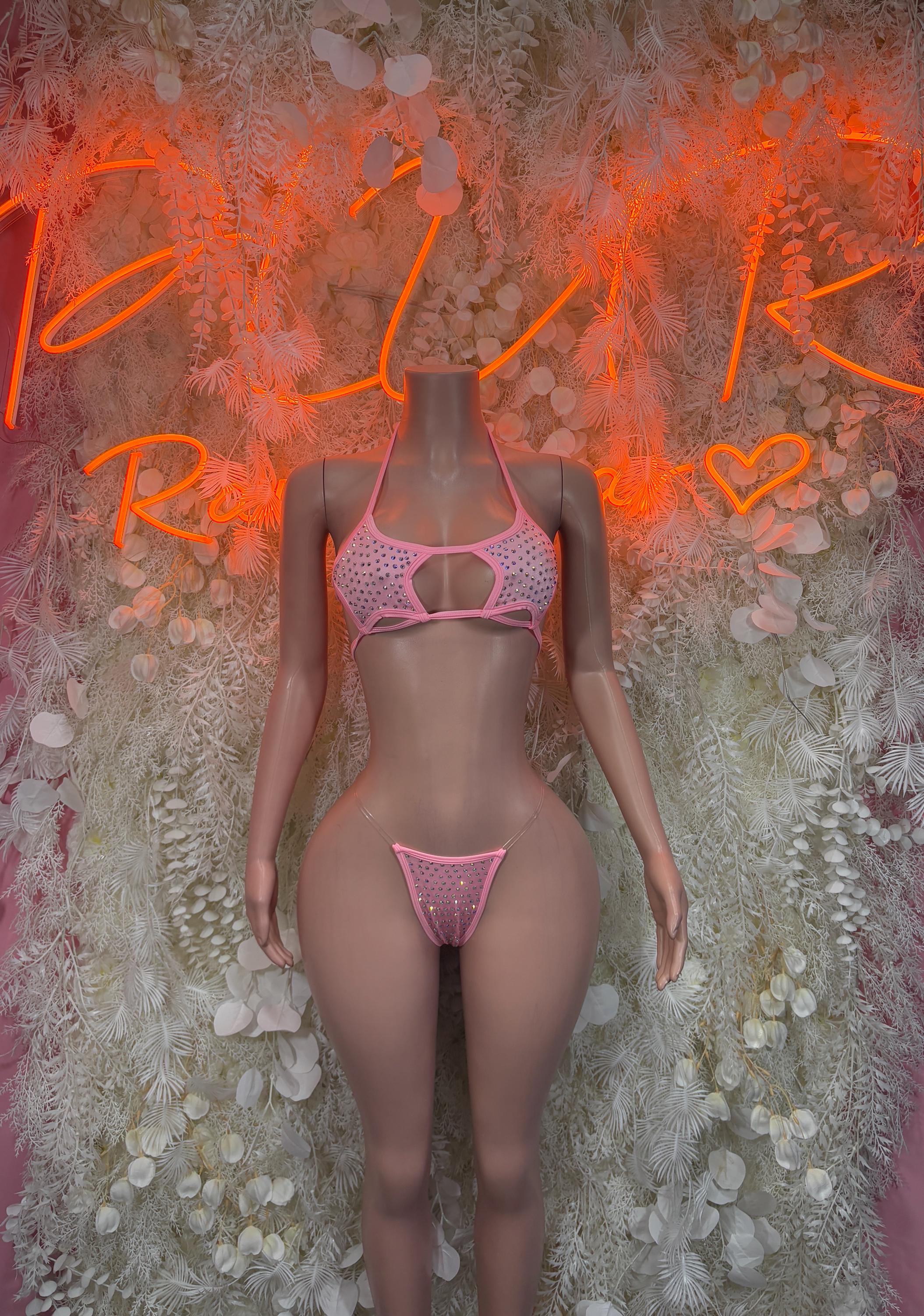 Pink rhinestone two-piece bikini with halter-style top and matching thong bottom