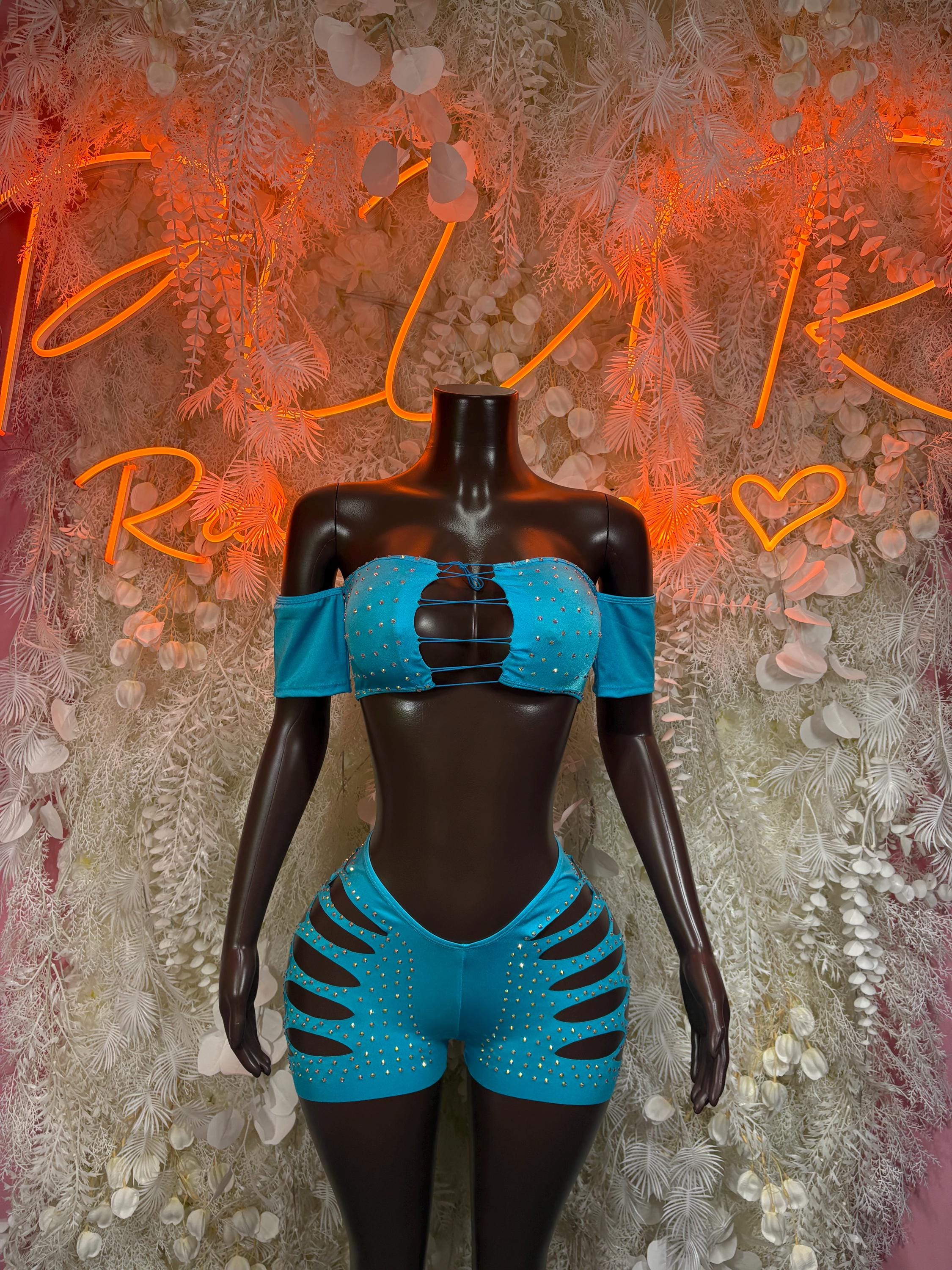 Turquoise rhinestone rave two-piece with off-shoulder bandeau top and cutout shorts