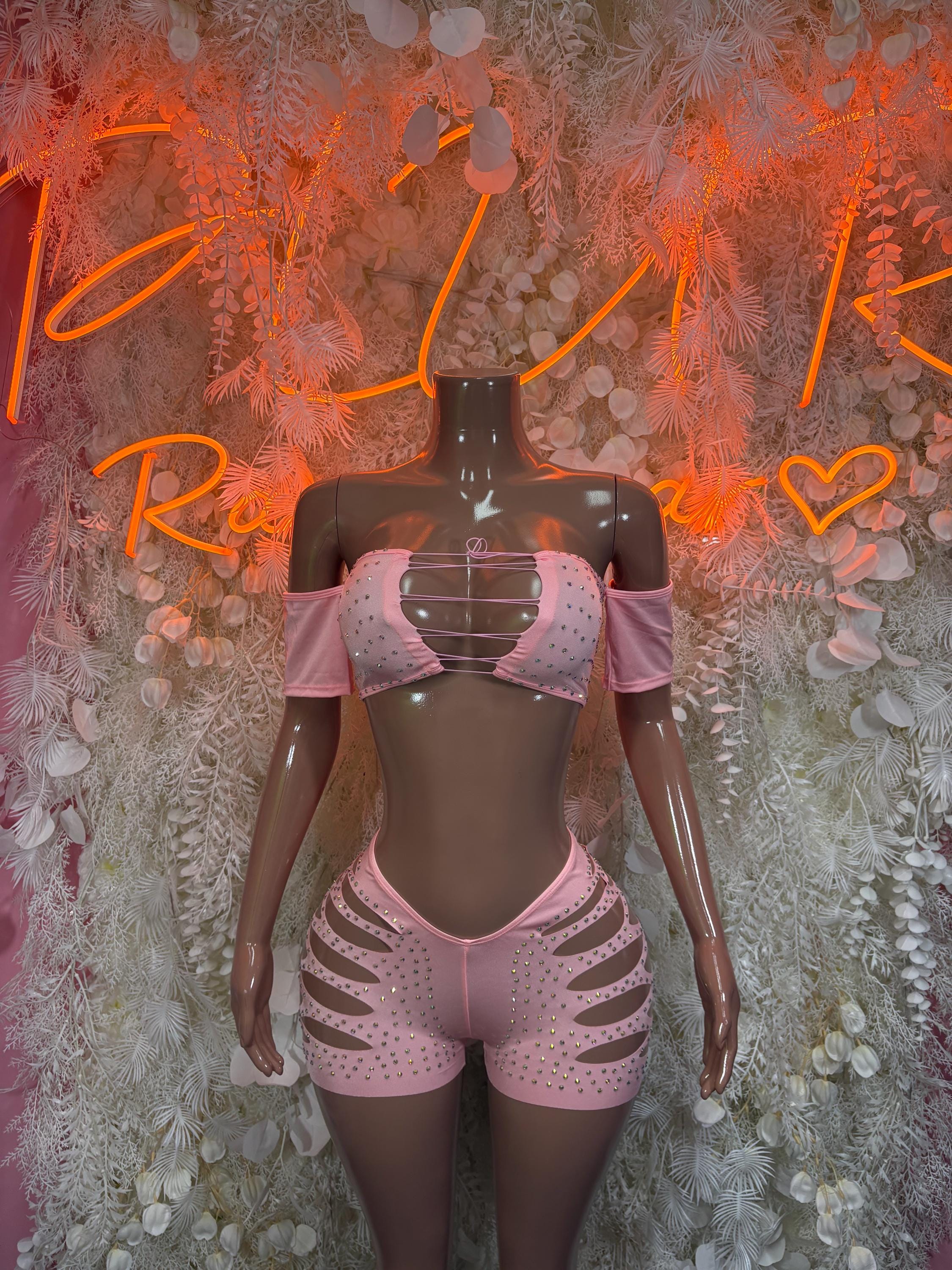 Pink rhinestone rave bodysuit set with off-shoulder sleeves and cutout shorts