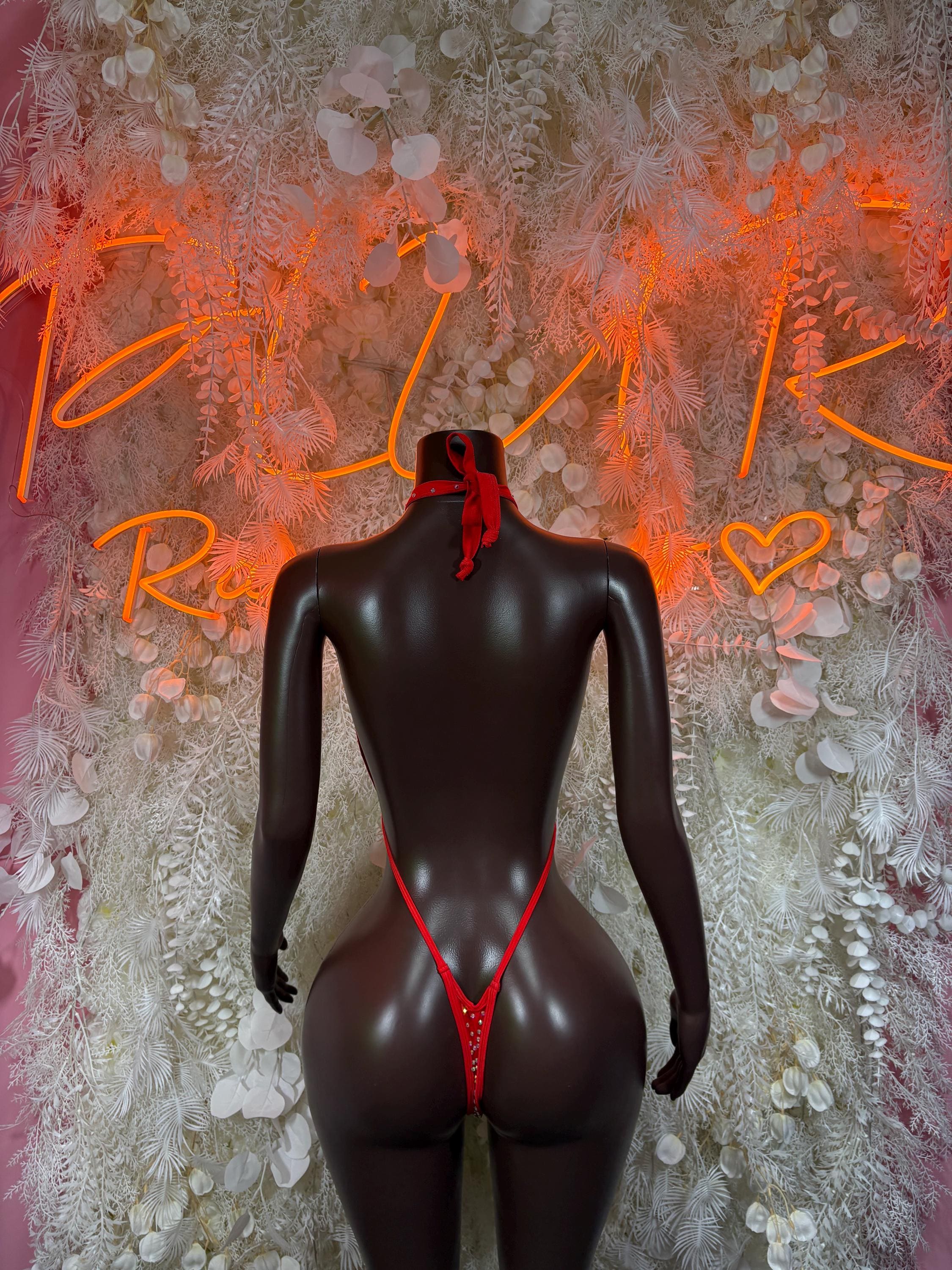Red rhinestone thong bodysuit with halter neckline and deep V back