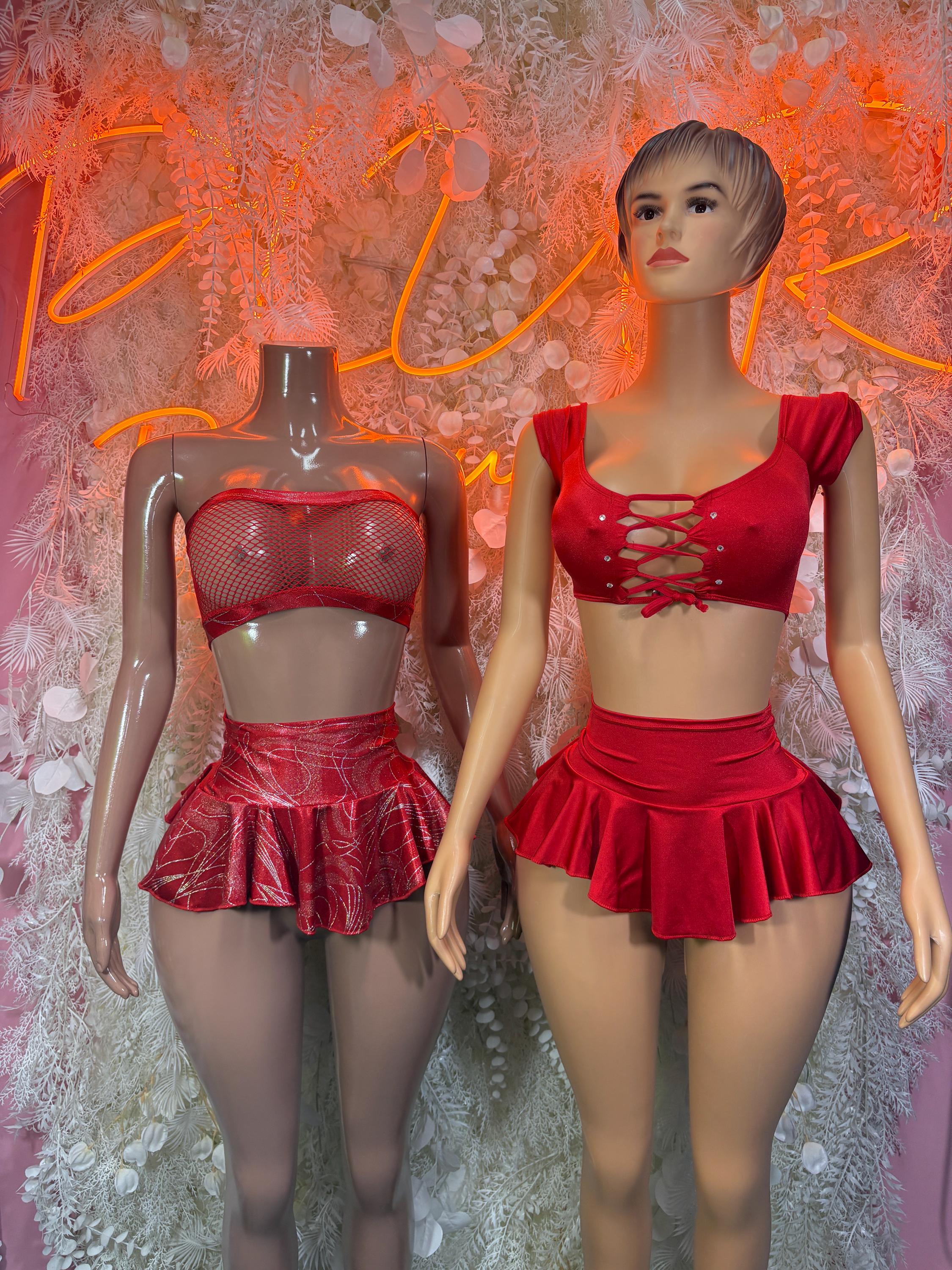 Red two-piece skirt set with lace-up mesh bra and ruffled mini skirt, front views