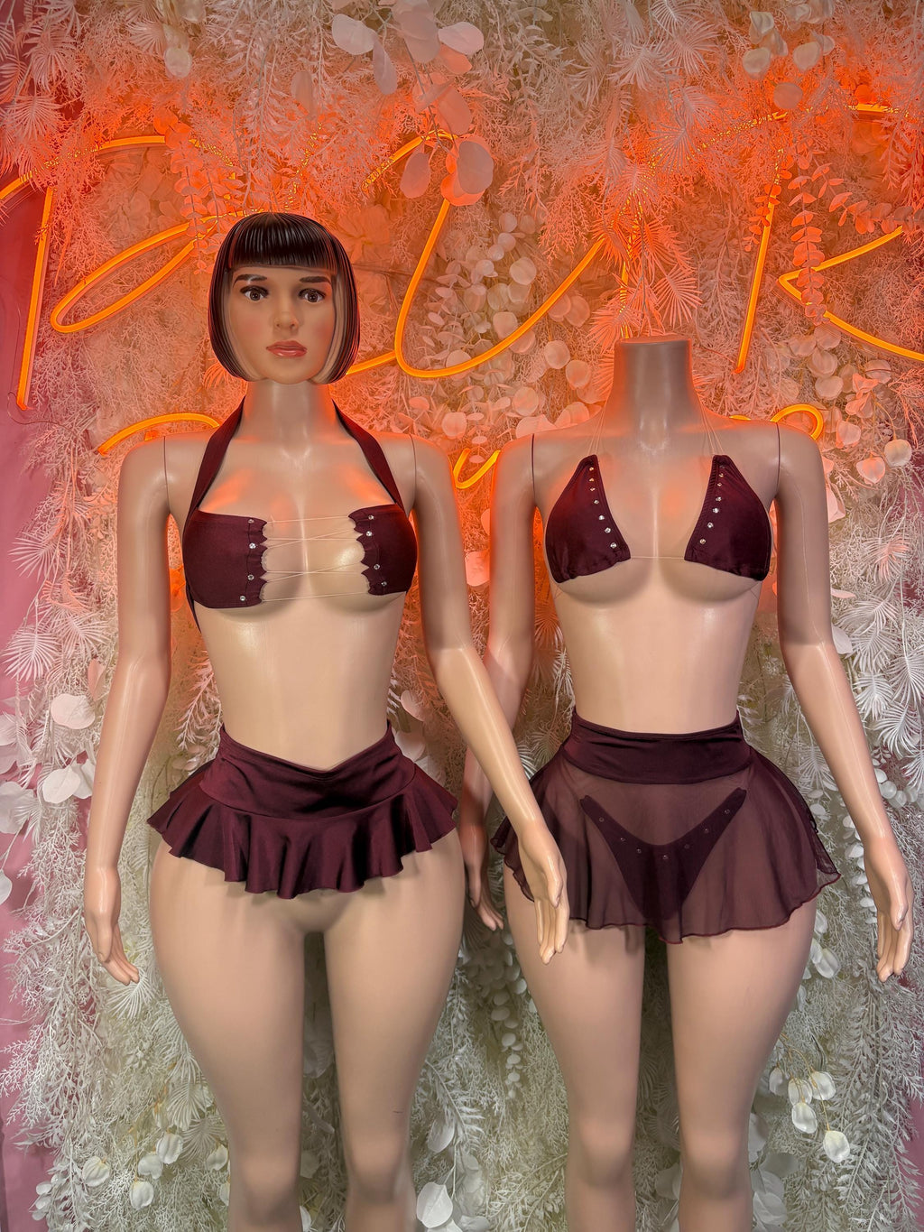 Burgundy two-piece festival skirt set with jeweled bra top and layered flared mini skirt