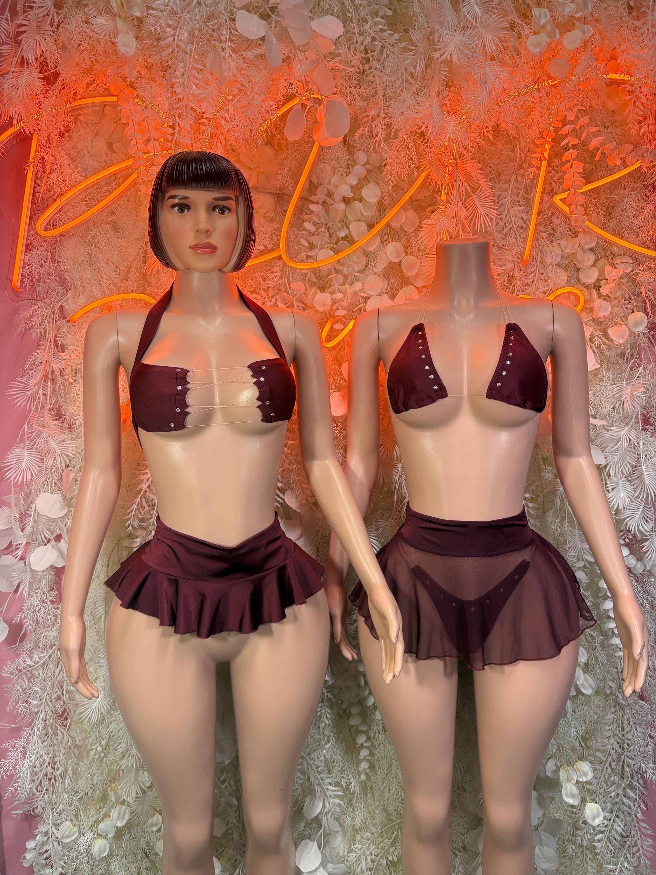 Burgundy two-piece festival skirt set with jeweled bra top and layered flared mini skirt