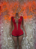 Red rave bodysuit with deep V neckline and short sleeves, fitted romper fit