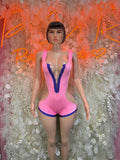 Pink and purple rave bodysuit with V-neck and zipper front, sleeveless high-leg.