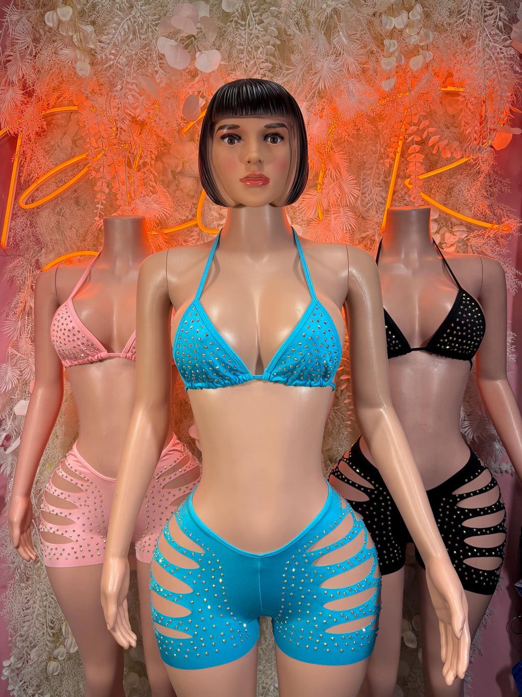 Blue rhinestone triangle bra and matching shorts set, with pink and black styles