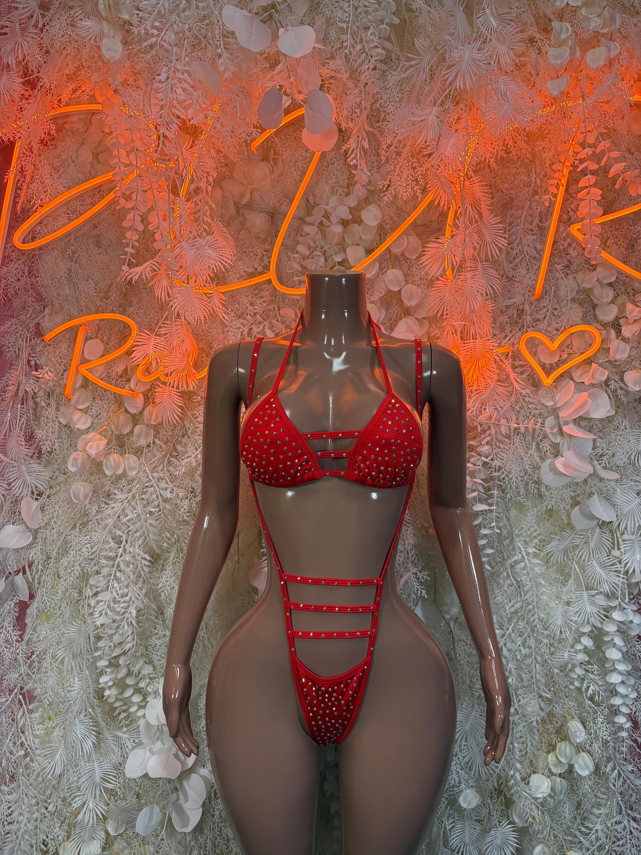 Red rhinestone rave two-piece set: triangle bra and high-cut thong with strappy waistband.